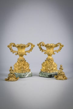 Pair of Gilt Bronze Two Handled Covered Urns on Marble Bases, French, circa 1890