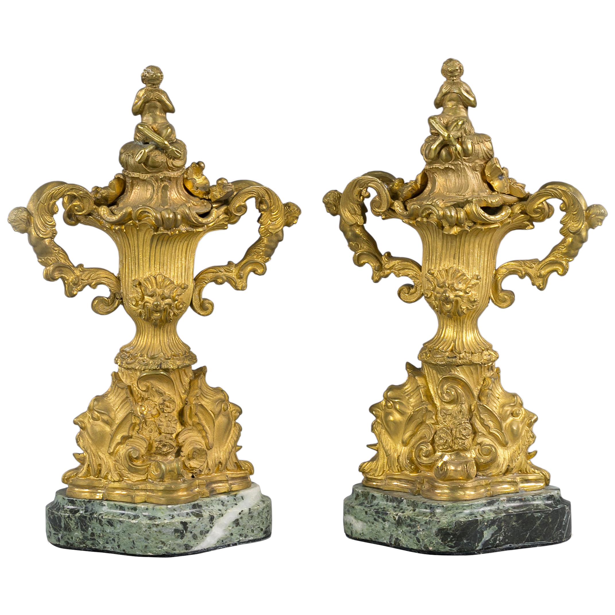 Pair of Gilt Bronze Two Handled Covered Urns on Marble Bases, French, circa 1890