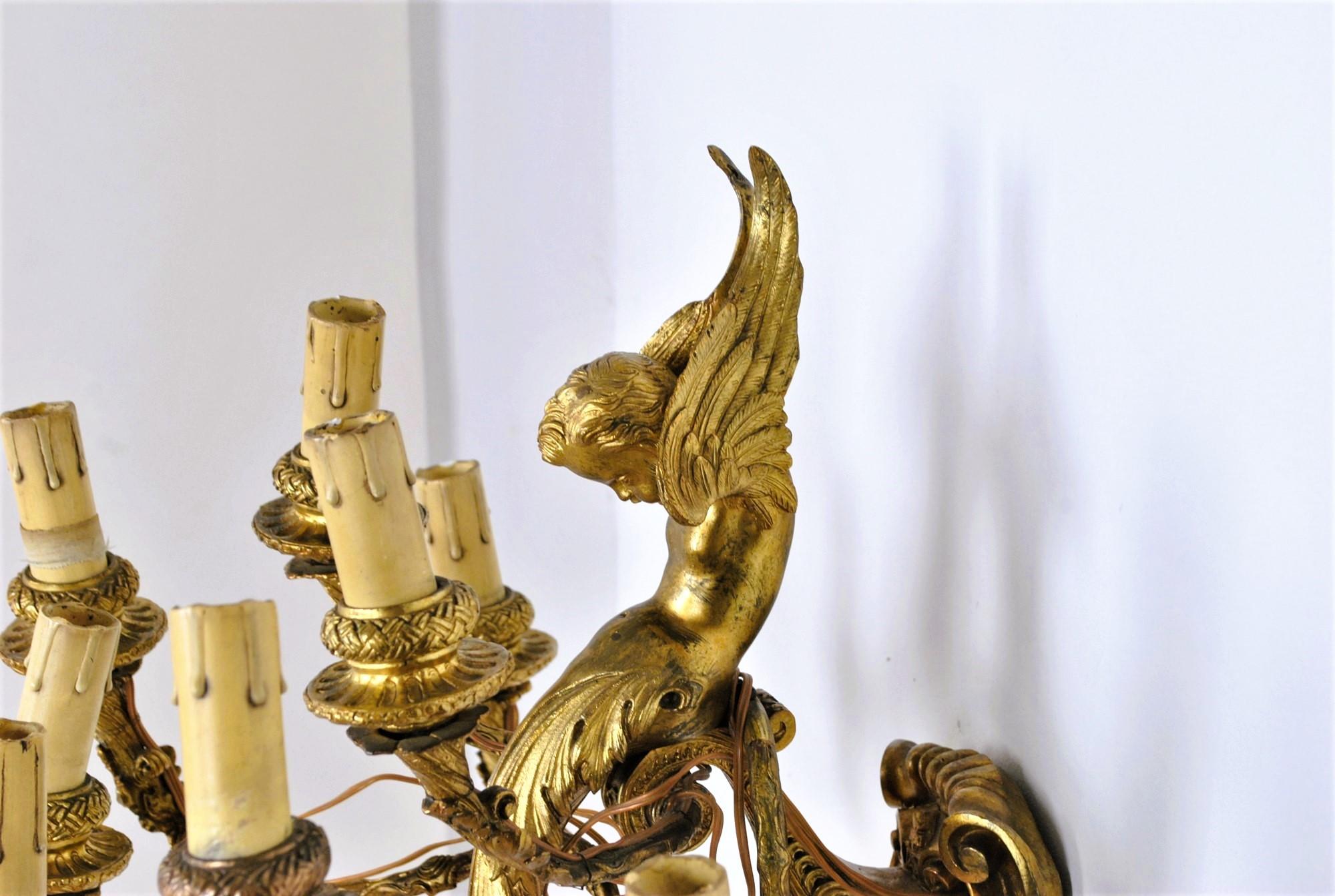 Bronzo Coppia di applique in bronzo dorato con putti alati, Napoleone III, XIX secolo in vendita