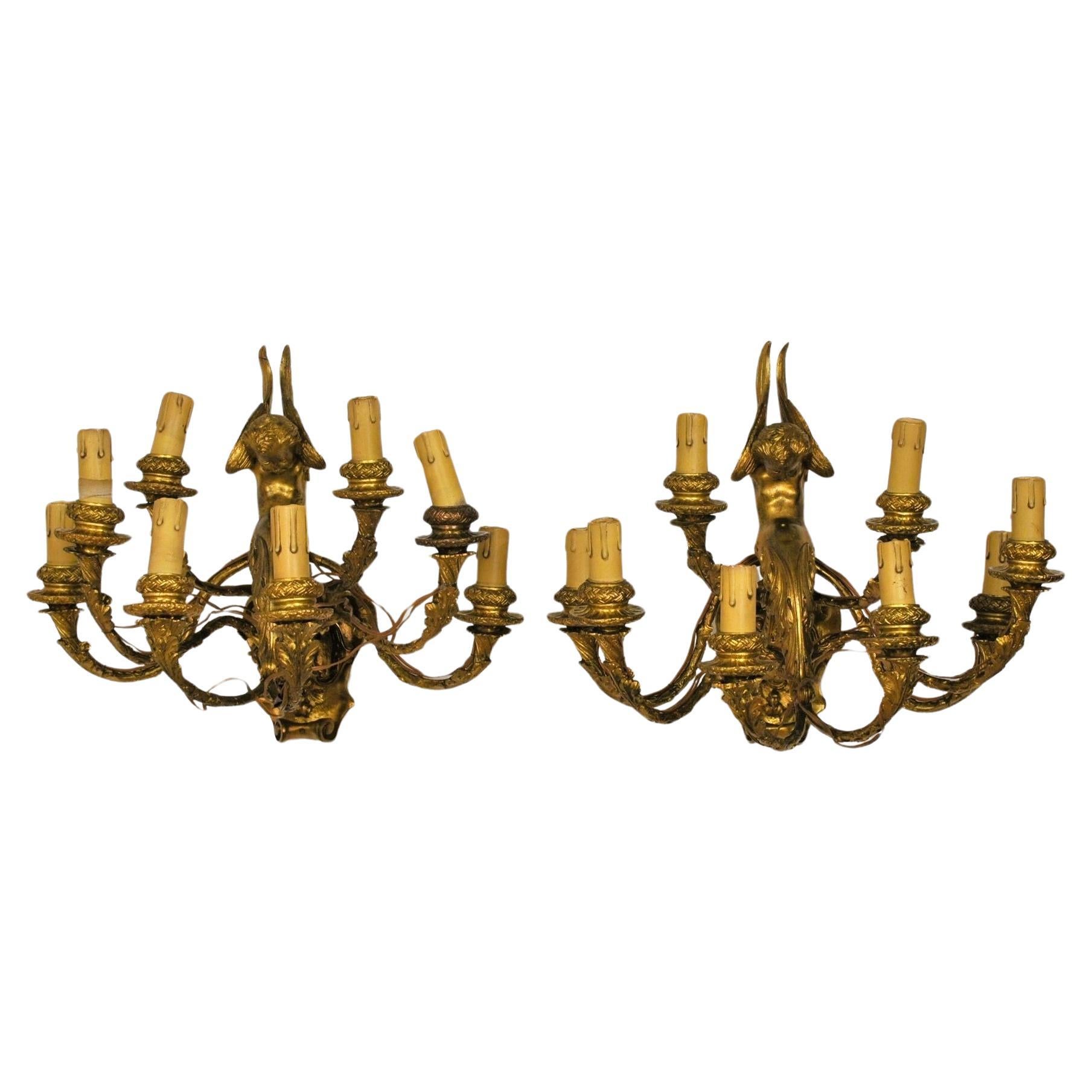 Coppia di applique in bronzo dorato con putti alati, Napoleone III, XIX secolo in vendita