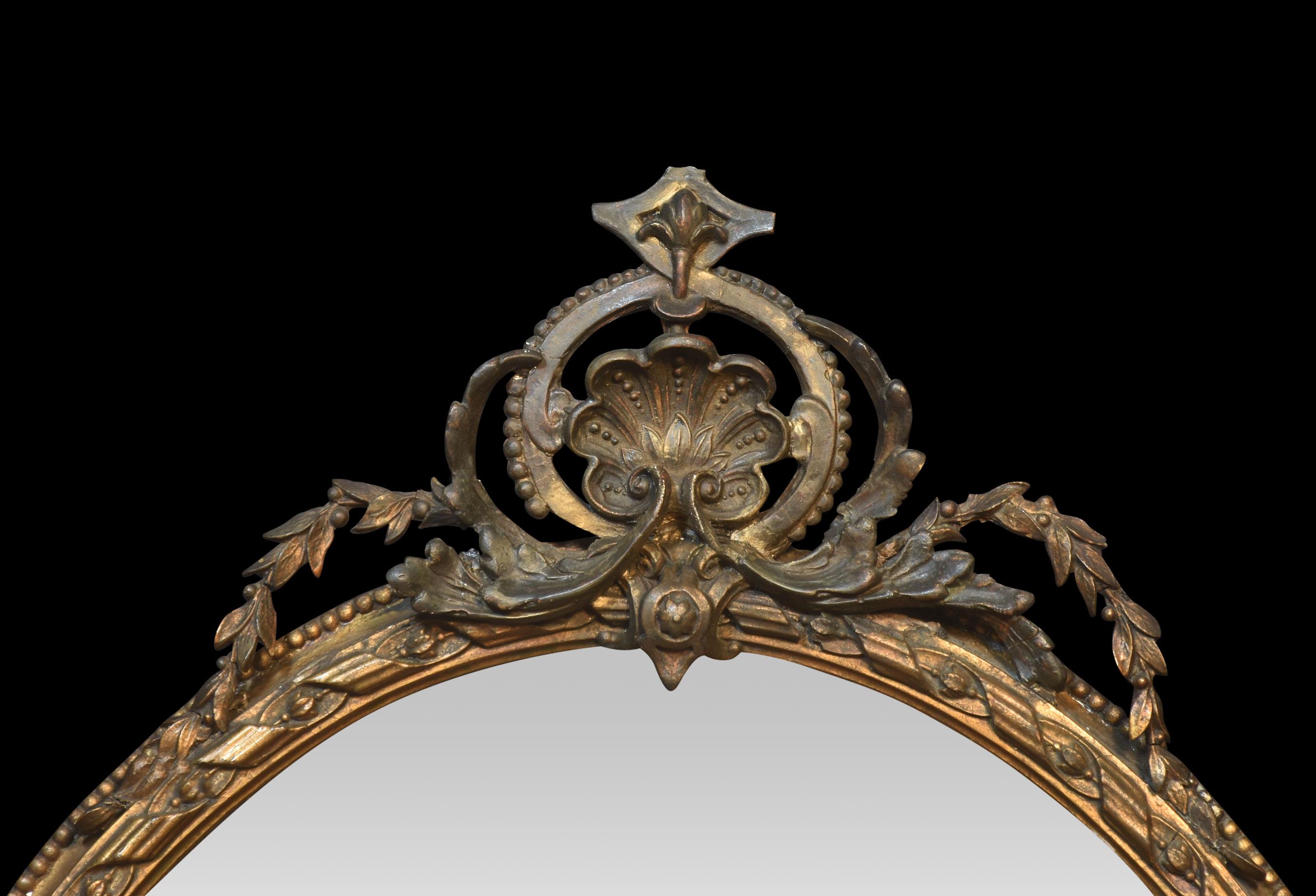 Pair of gilt girandole wall mirrors the oval frames with ribbon decoration above moulded frames having twin branch scones which have been converted for electricity.
Dimensions
Height 40 Inches
Width 22.5 Inches
Depth 6 Inches.