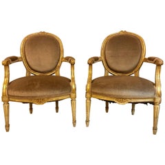 Pair of Gilt Gold Paint Decorated & Carved Louis XVI Style Armchairs or Fauteuil