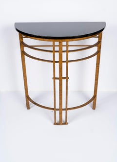 Pair of Gilt Iron and Granite Demilune Consoles