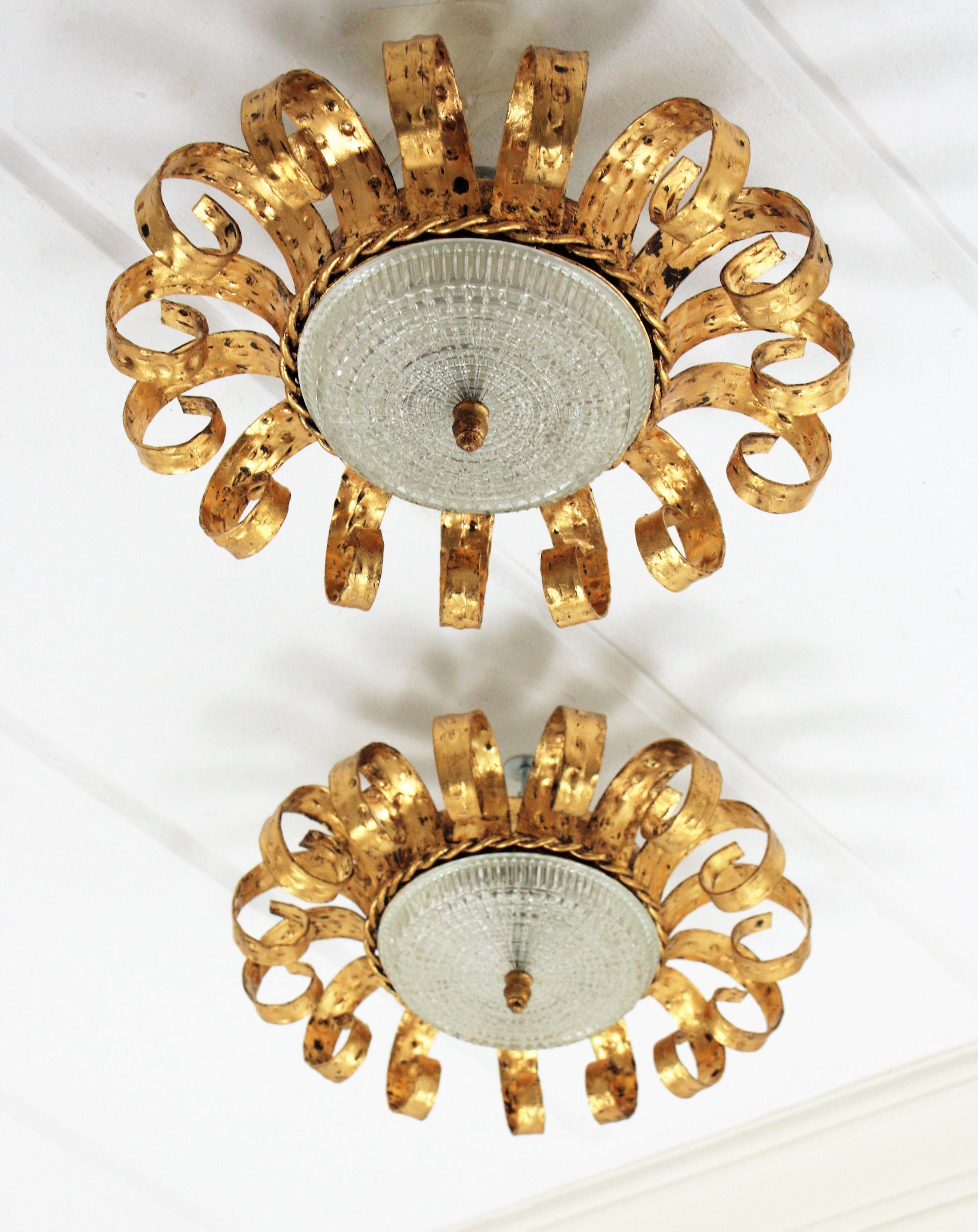 Pair of Sunburst Crown Ceiling Flush Mounts in Gilt Iron & Glass, Scroll Motif  In Good Condition For Sale In Barcelona, ES