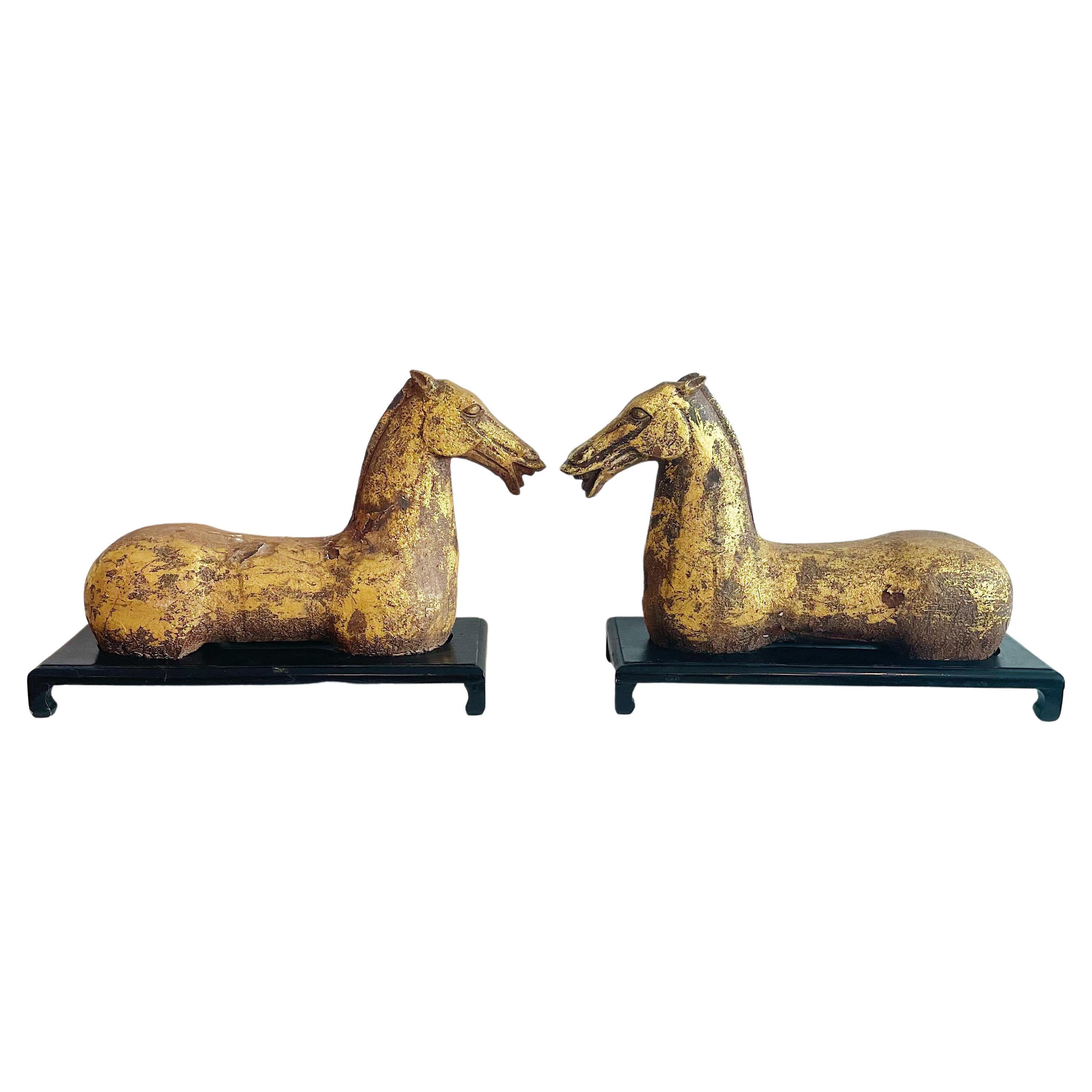 Pair of Gilt Iron Han Dynasty Style Opposing Horse Sculptures on Stands