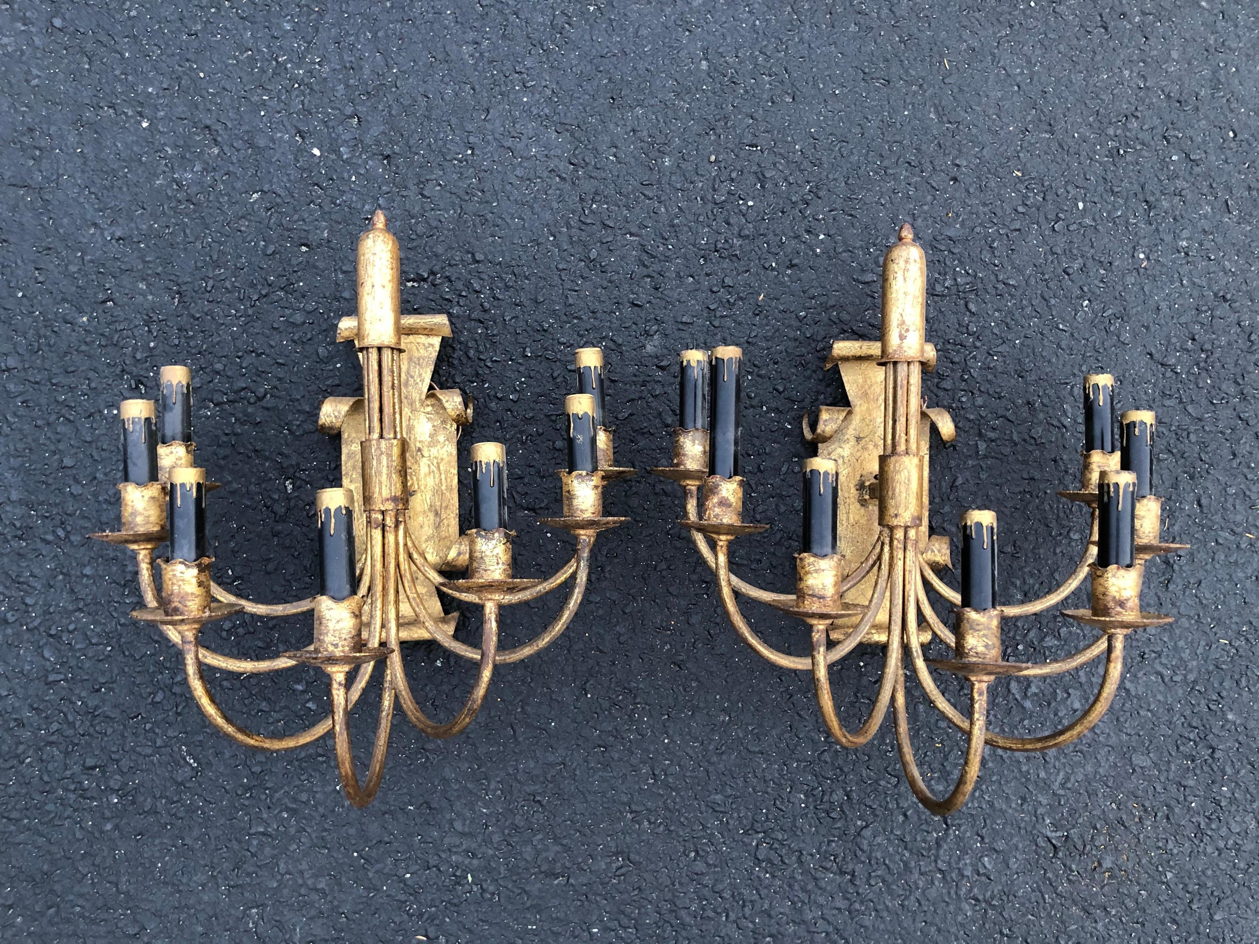 Hollywood Regency Pair of Gilt Iron Sconces with Black Candle Covers For Sale