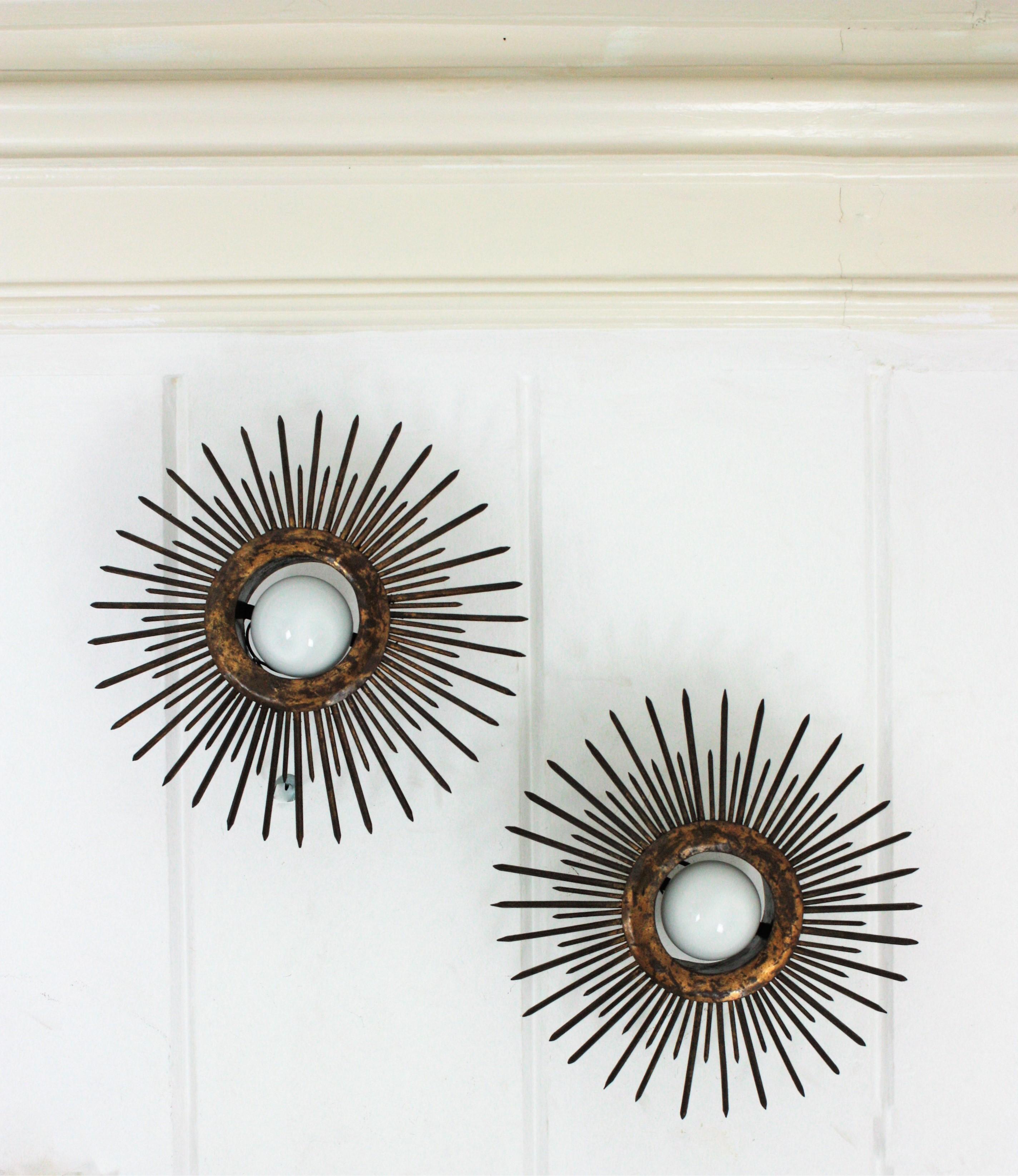 Wrought Iron Pair of Gilt Iron Sunburst Brutalist Light Fixtures with Design of Nails For Sale