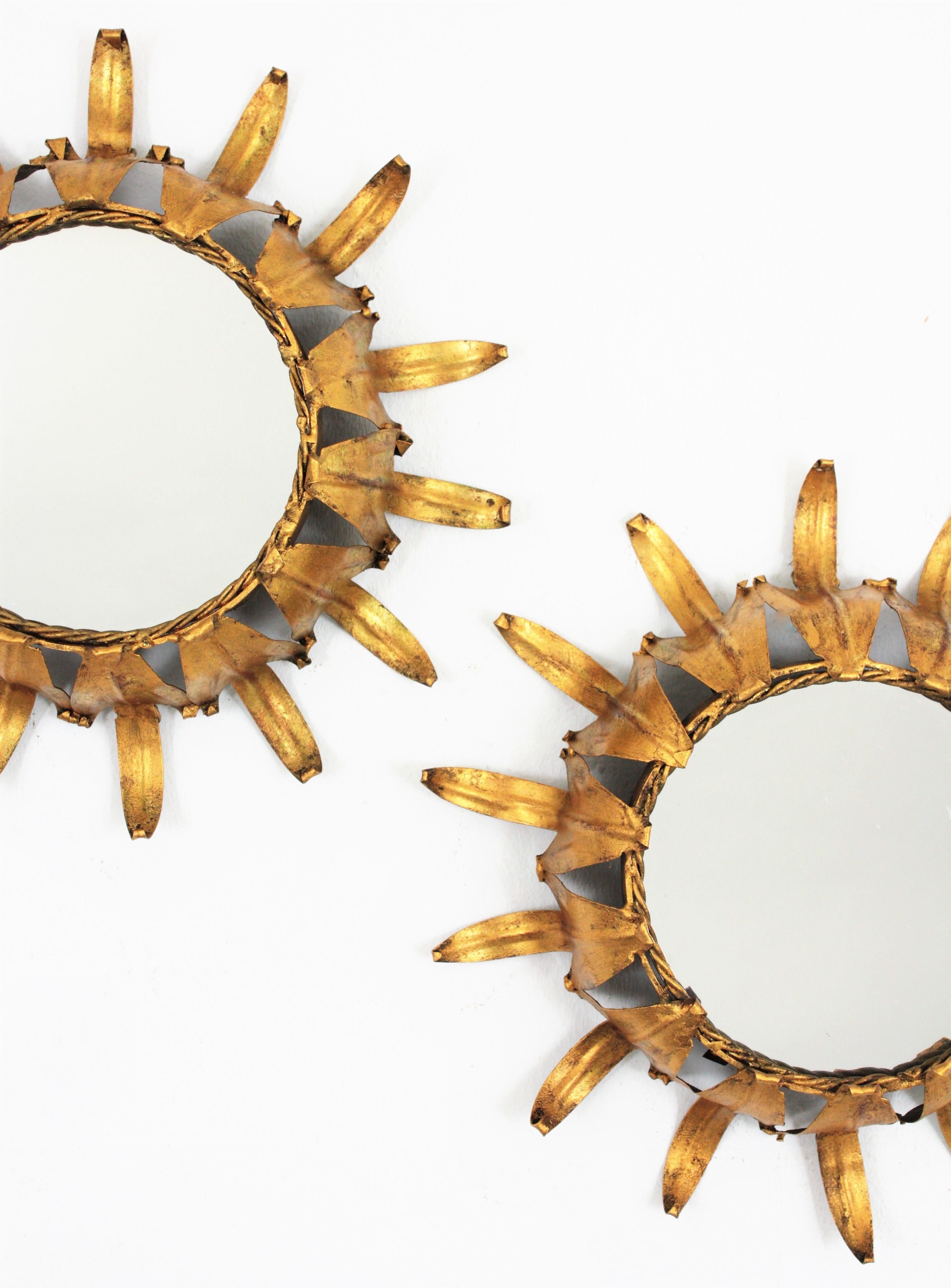 Mid-Century Modern Pair of Sunburst Wall Mirrors in Gilt Iron in the Style of Hollywood Regency
