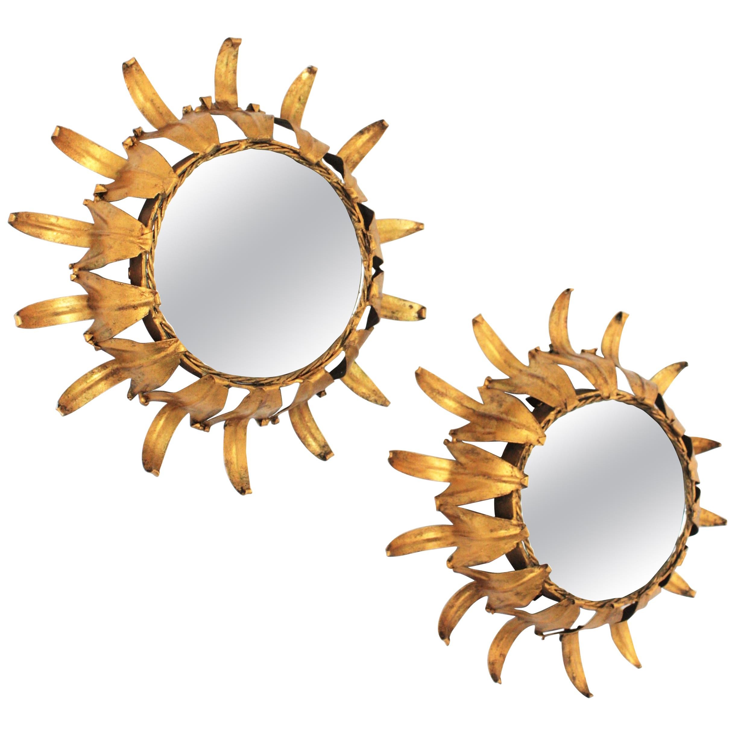 Pair of Sunburst Wall Mirrors in Gilt Iron in the Style of Hollywood Regency