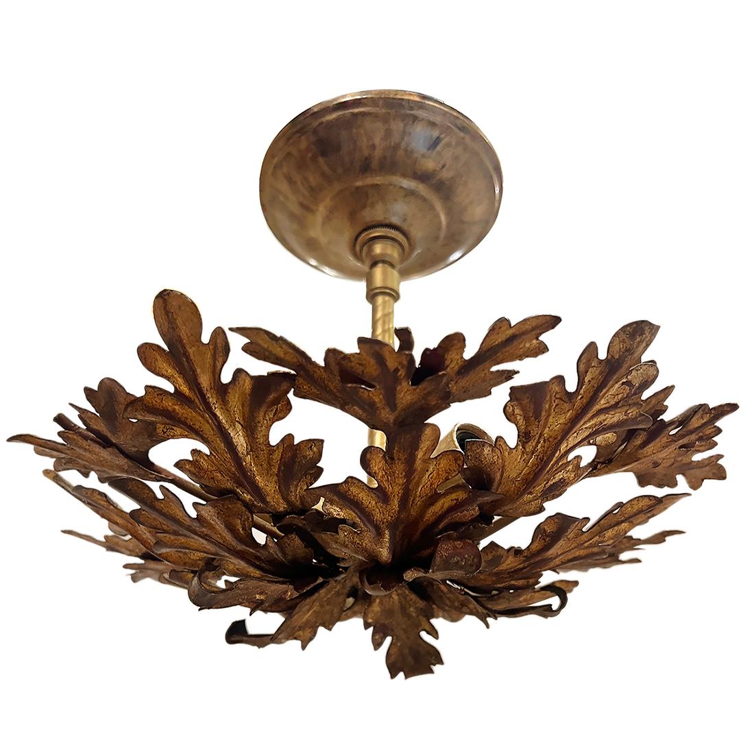 Pair of circa 1960's gilt metal foliage fixtures with 3 lights each. Vendu individuellement

Mesures :
Present drop: 10.5