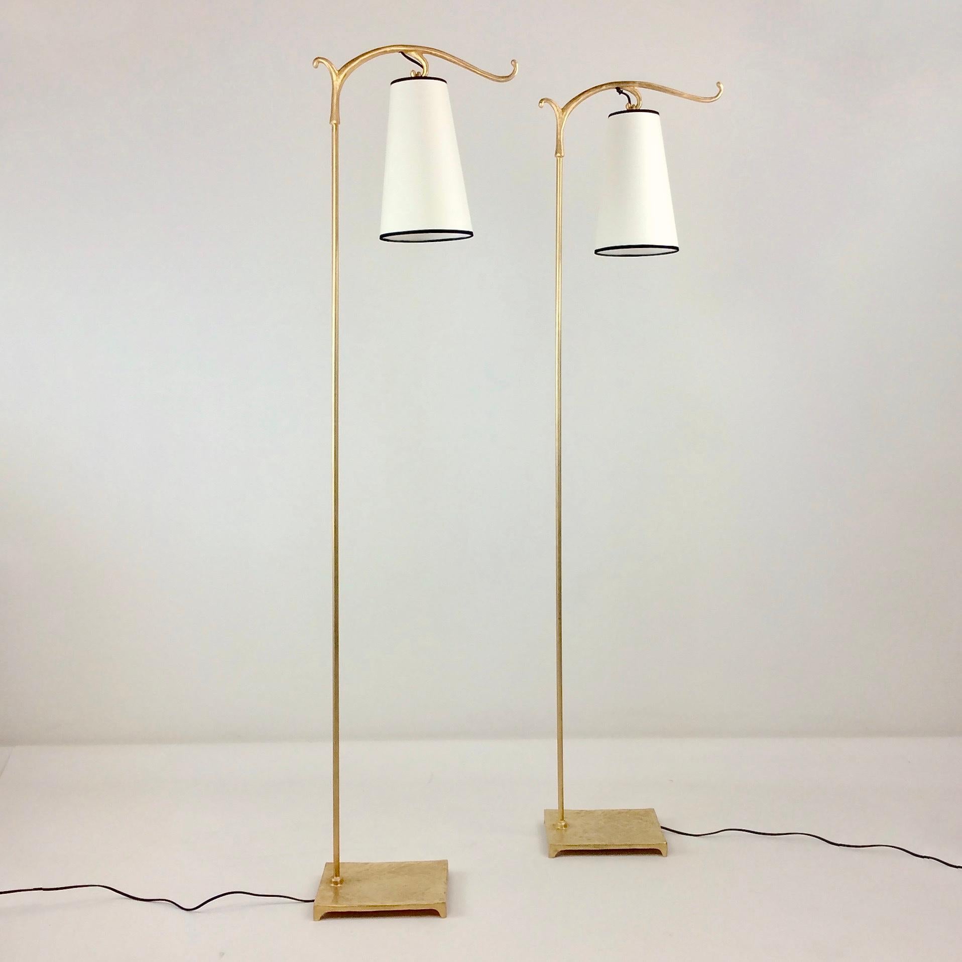 Nice pair of floor lamps, circa 1980, France.
Gilt wrought iron. New white fabric shades with black fabric border.
One E27 bulb.
Dimensions: 160 cm H, 38 cm W, 19 cm D.
All purchases are covered by our Buyer Protection Guarantee.
This item can be