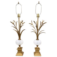 Coppia di lampade in metallo dorato