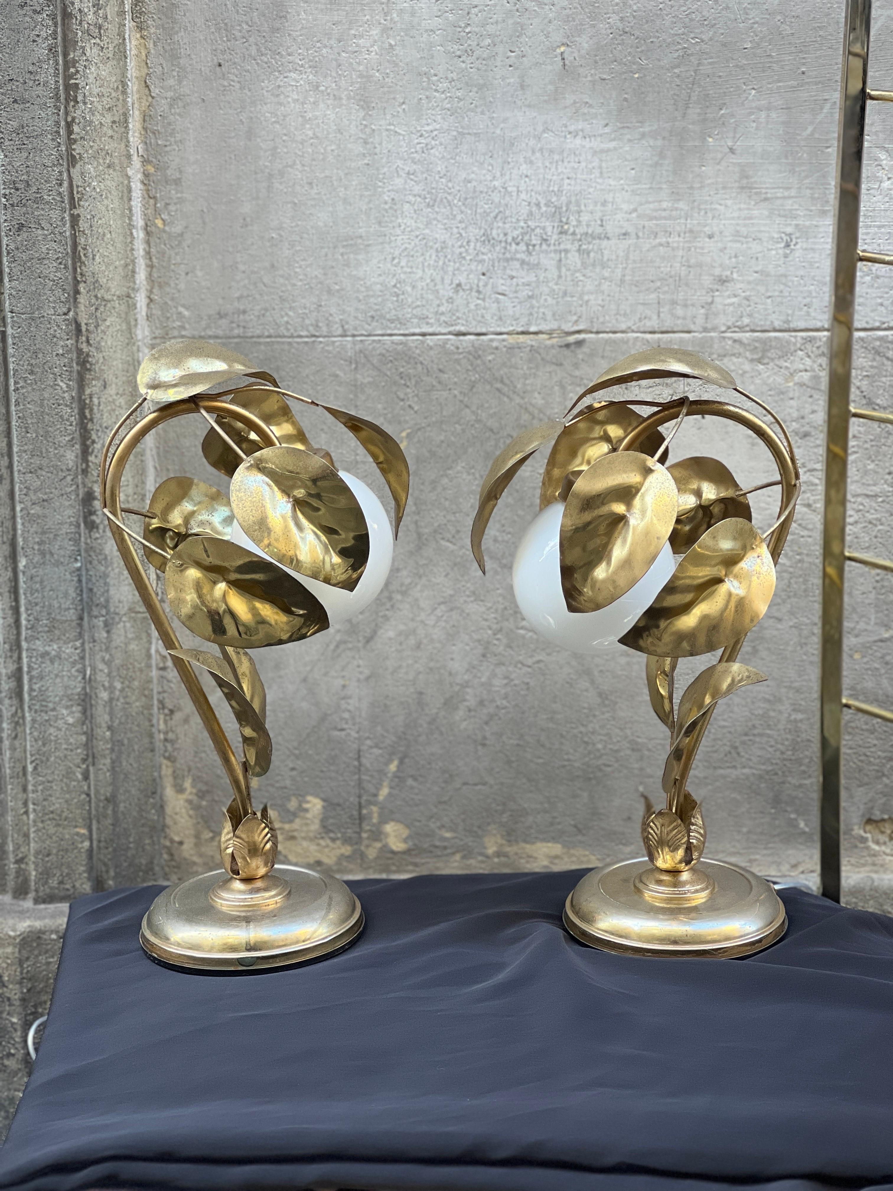 Pair of gilt metal leaves table lamps with white glass ball.
Good vintage condition with minor imperfections consistent with age.
One light-bulb for each lamp