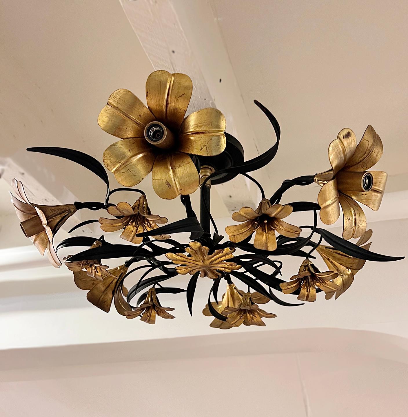 Pair of circa 1960's Italian gilt metal light fixtures with floral motif. Semi flush body, with 6 lights each. Sold individually.

Measurements:
Height: 9