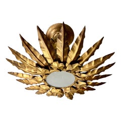 Pair of Gilt Metal Sunburst Fixtures
