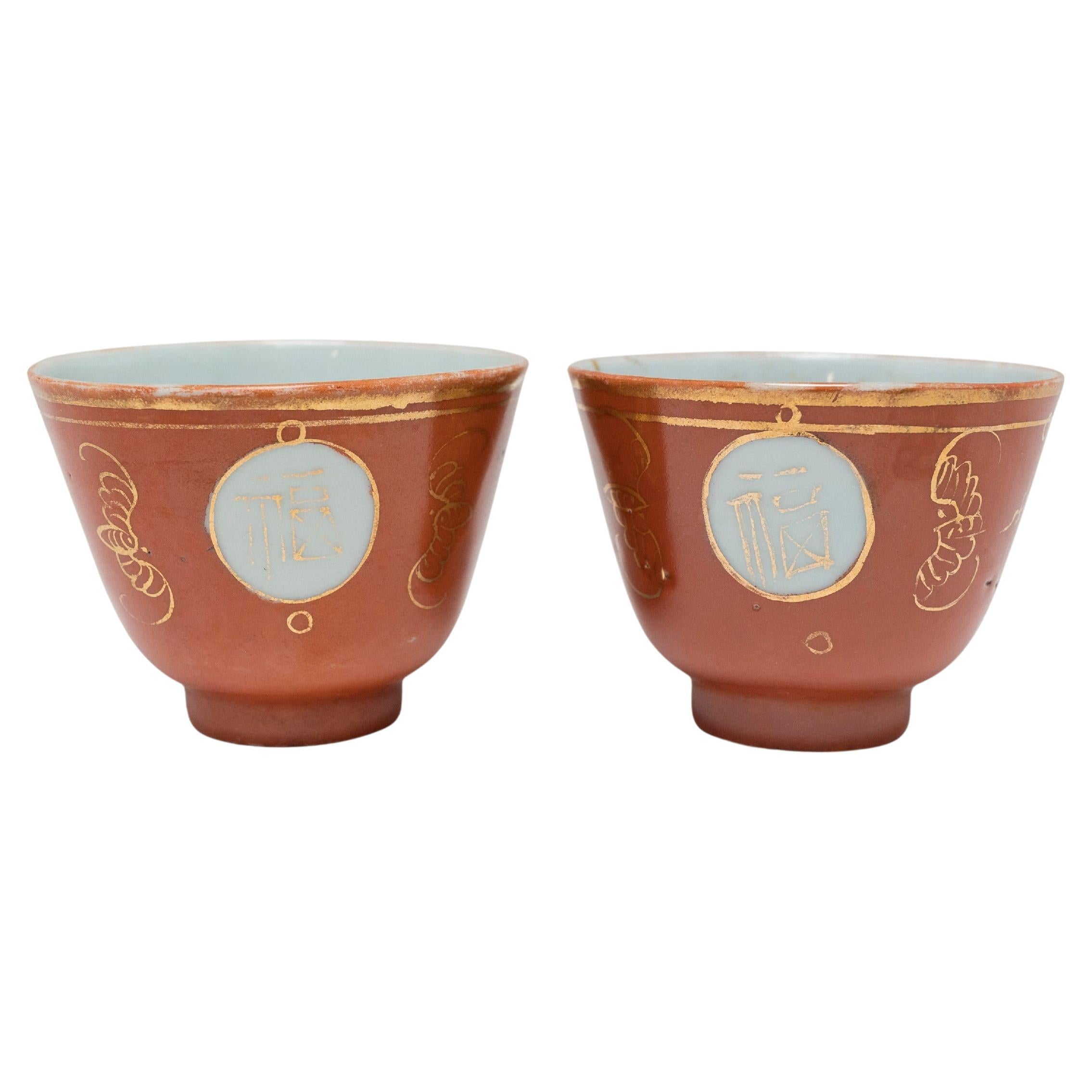 Pair of Gilt Orange Chinese Teacups
