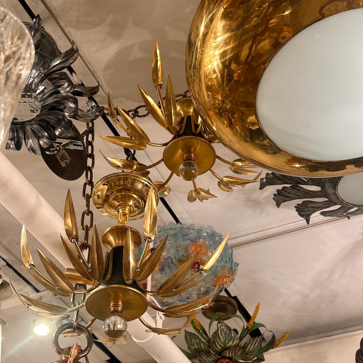 Métal Paire de luminaires en forme de soleil doré, vendus individuellement en vente