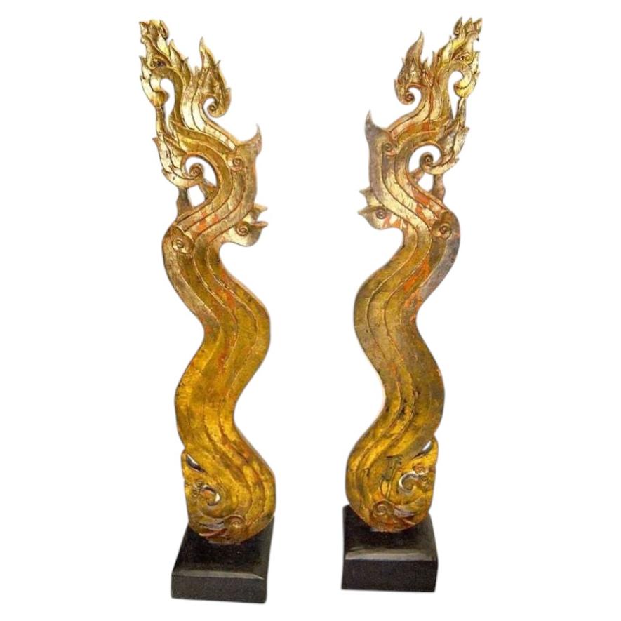 Pair of Gilt Wood Asian Naga Sculptures on Ebonized Bases