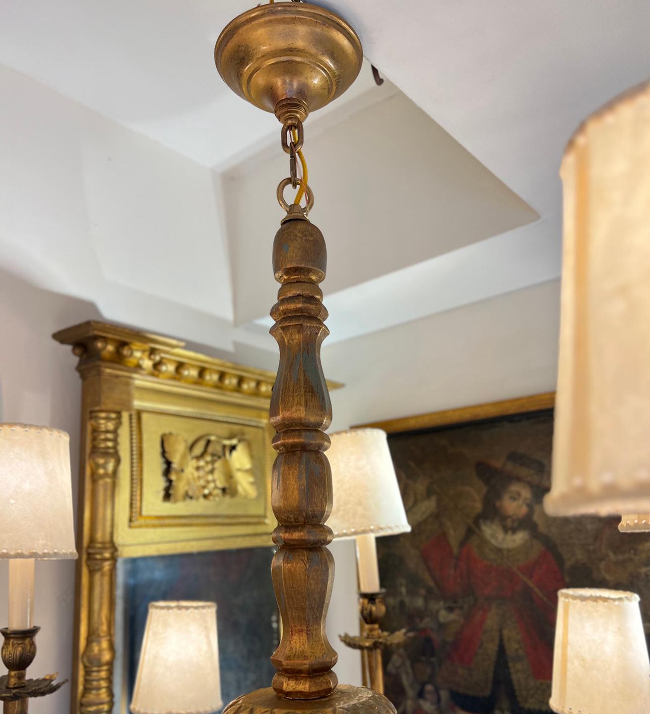 Pair of circa 1930's Italian carved and gilt wood chandeliers with 10 lights. Sold Individually.

Measurements:
Present drop: 40