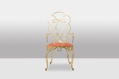 Paire de fauteuils en fer forgé doré, vers 1990