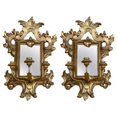Pareja de candelabros de madera dorada y espejo, S. XIX, con 3 boquillas cada uno