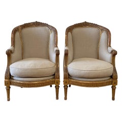 Paar antike Bergere-Stühle aus Giltwood im Louis-XVI-Stil