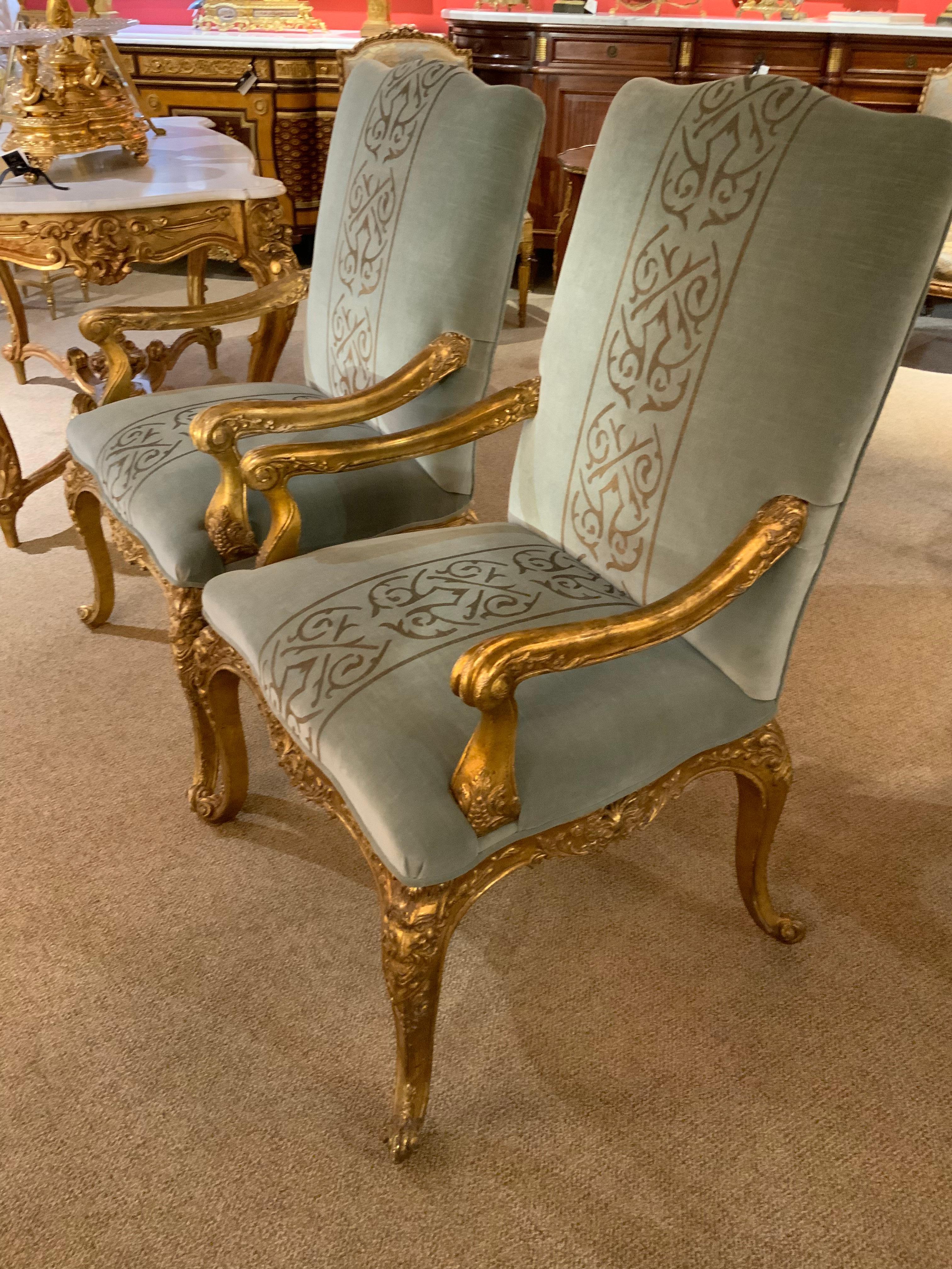 Great quality arm chairs upholstered in beautiful silk velvet with gold design
At the center. Gilt wood with gracefully carved arms and legs in the Louis XV-
Style ending in cabriole foot.
    