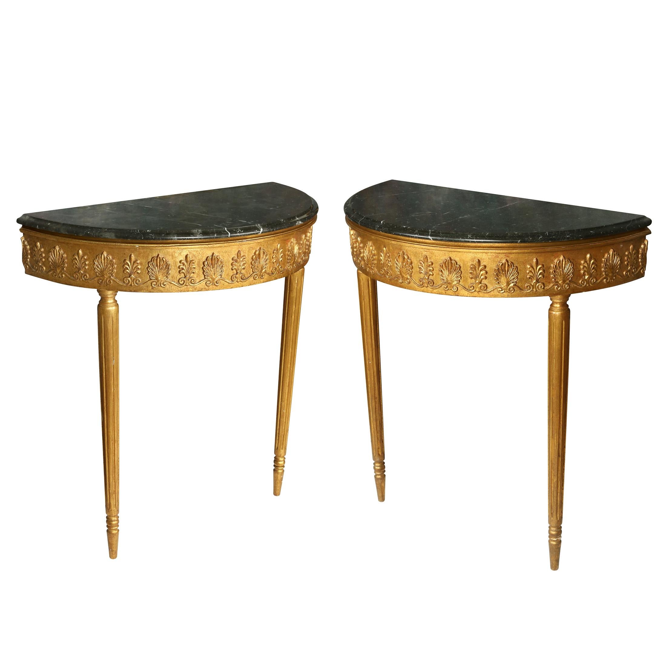 A pair of Louis XV style giltwood demilune console tables with green marble tops.