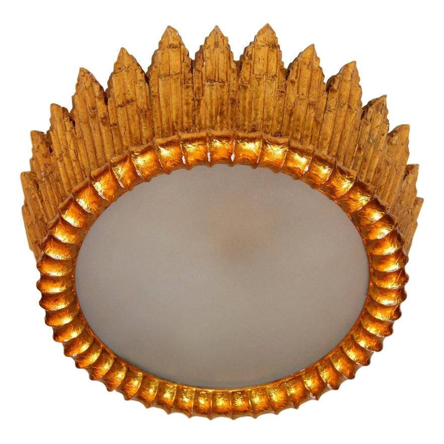 Paire de pendentifs en bois doré, vendus individuellement