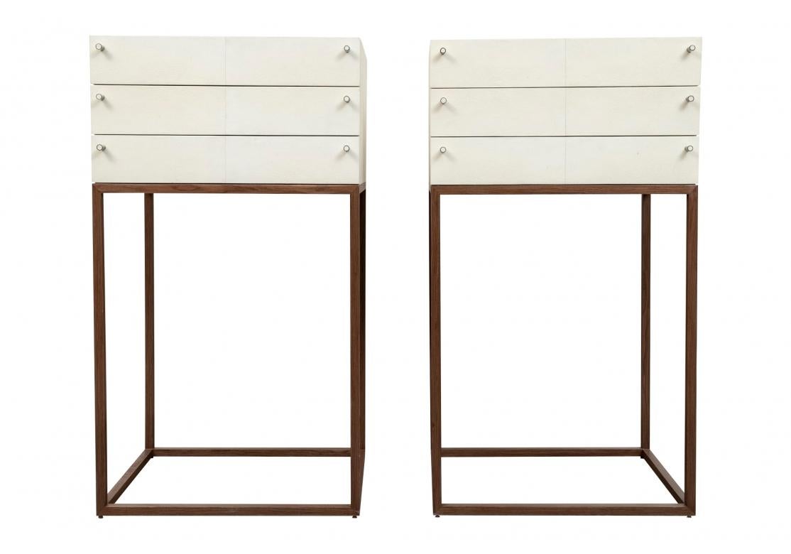 Elegant and stylish pair of Drawer Stands from Ginger Brown covered in Ivory tone Shagreen. Supported by Minimal open wood stands and having Chrome pulls capped with Shagreen. Metal Ginger Brown tags affixed on the inner drawers. 

Each Drawer Stand