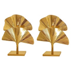 Pair of Ginko brass table lamps, Italy