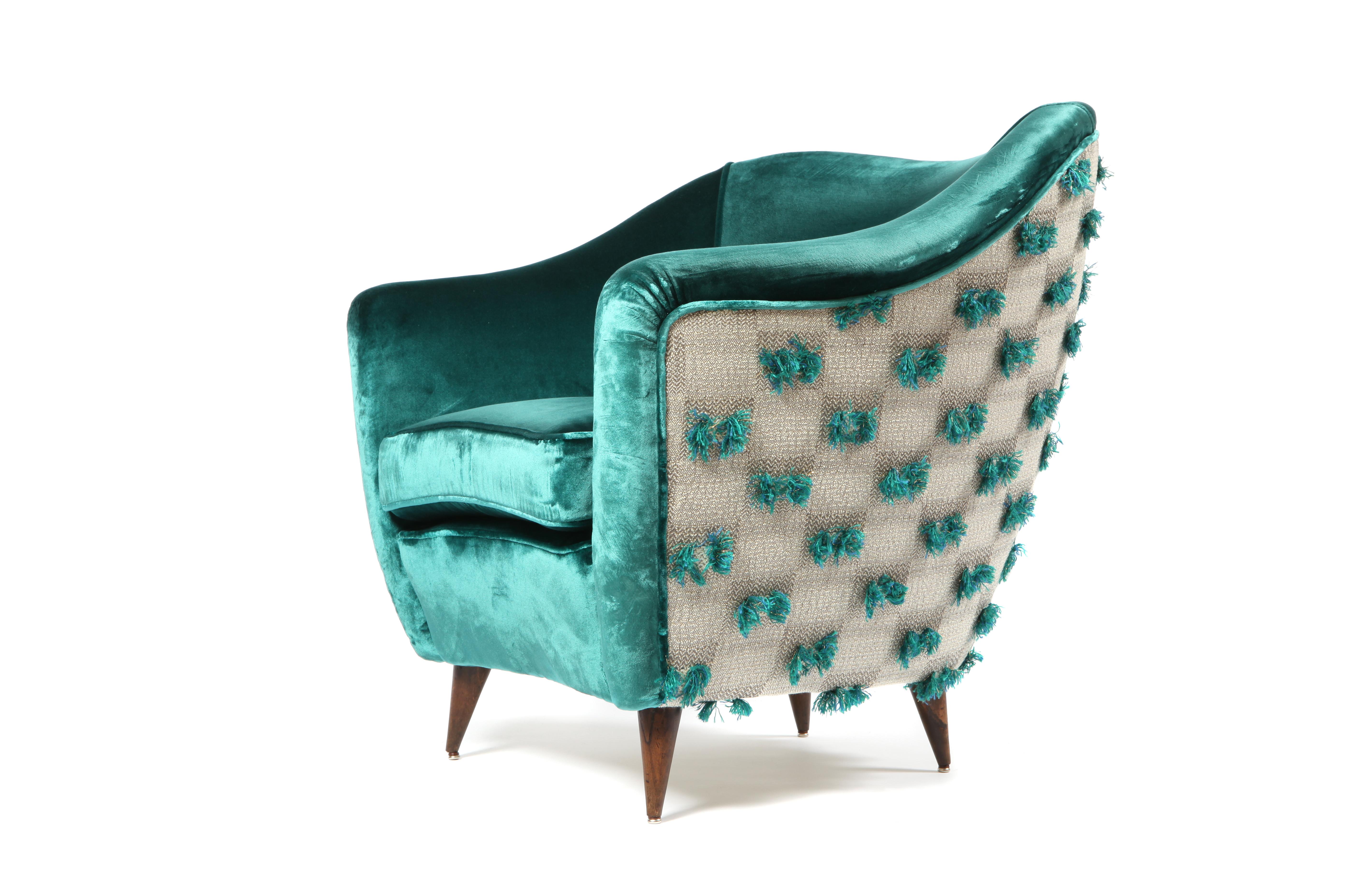 A pair of Gio Ponti chairs designed for Casa e Giardino, circa 1938. Set on midcentury tapered wooden legs, these chairs have been lovingly restored and reupholstered on the Mediterranean Tuscan coast in Italy by as master craftsman.

We have