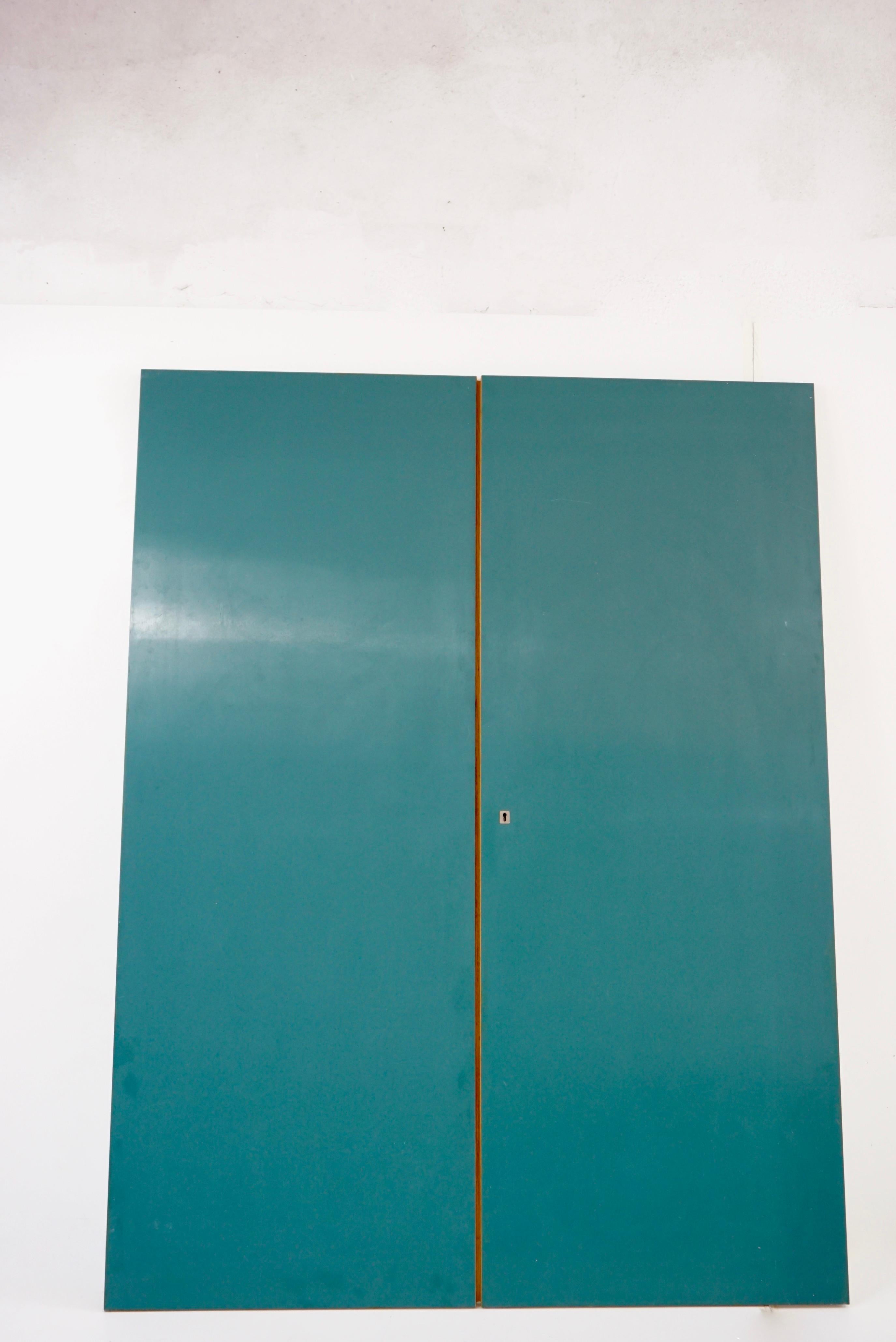 pair of GIO PONTI wall cupboard doors, wardrobe, from the original furniture of the Hotel Parco dei Principi in Rome, 1964
ash, formica-laminate- mirror 
green-blu formica-laminate on the cover and white formica on the verso 
manufactured by dassi
