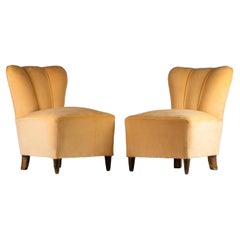 Pair of Gio Ponti light pink velvet and wooden feet armchairs