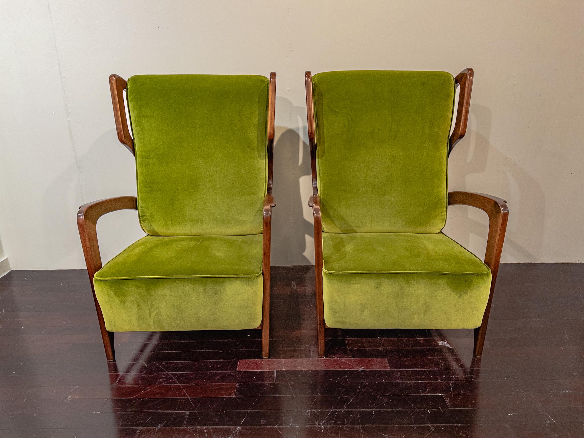 The allure of the Gio Ponti Lounge chairs lies in their rare blend of craftsmanship and design. Crafted from walnut, a wood prized for its warmth and durability, these chairs exude timeless elegance. Upholstered in luxurious fabric, they offer both