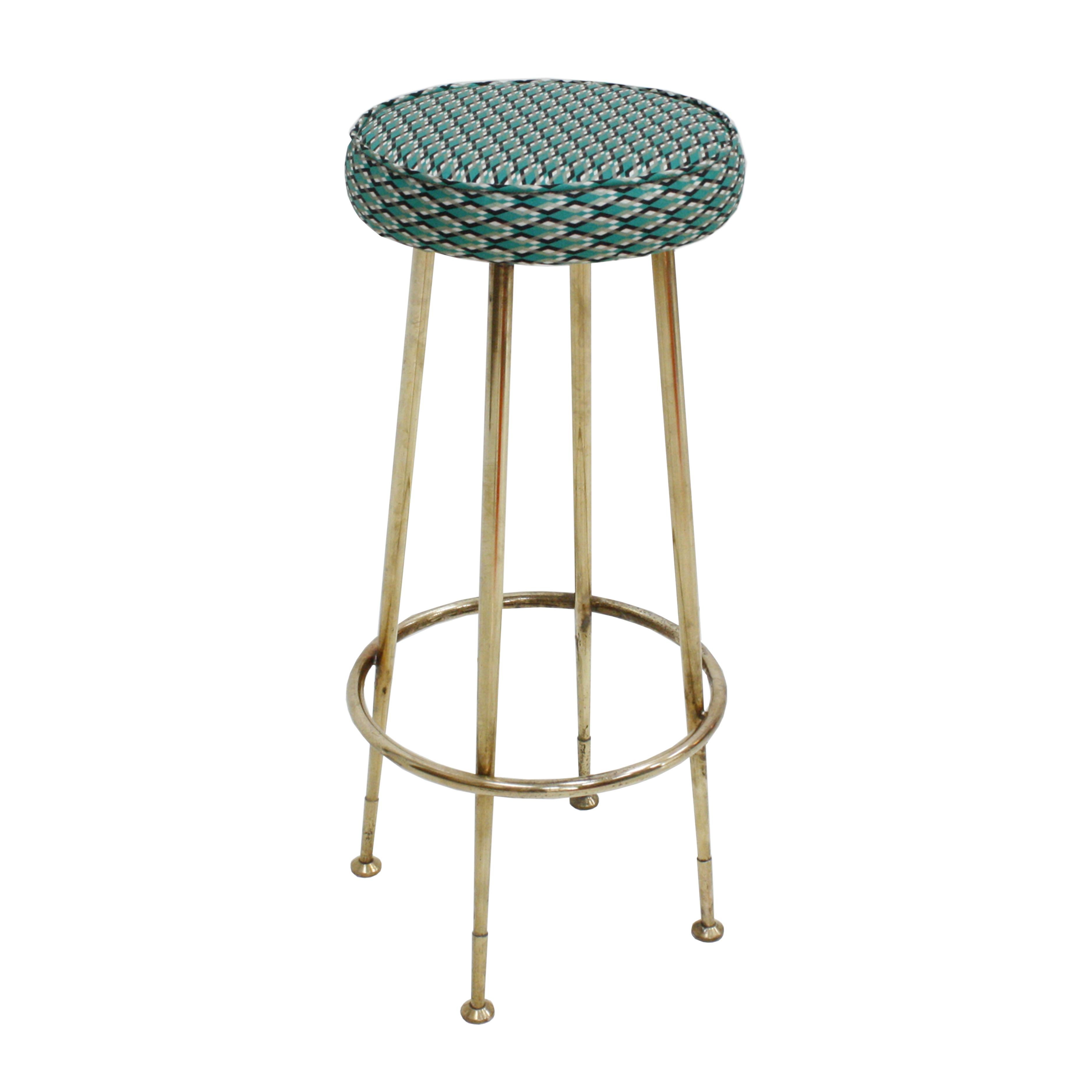 Pair of circular Italian bar stools in the style of Gio Ponti. Base made of brass and upholstered in cotton pattern fabric model “Serpentino” edited by Dedar. Made in Italy. 


 
