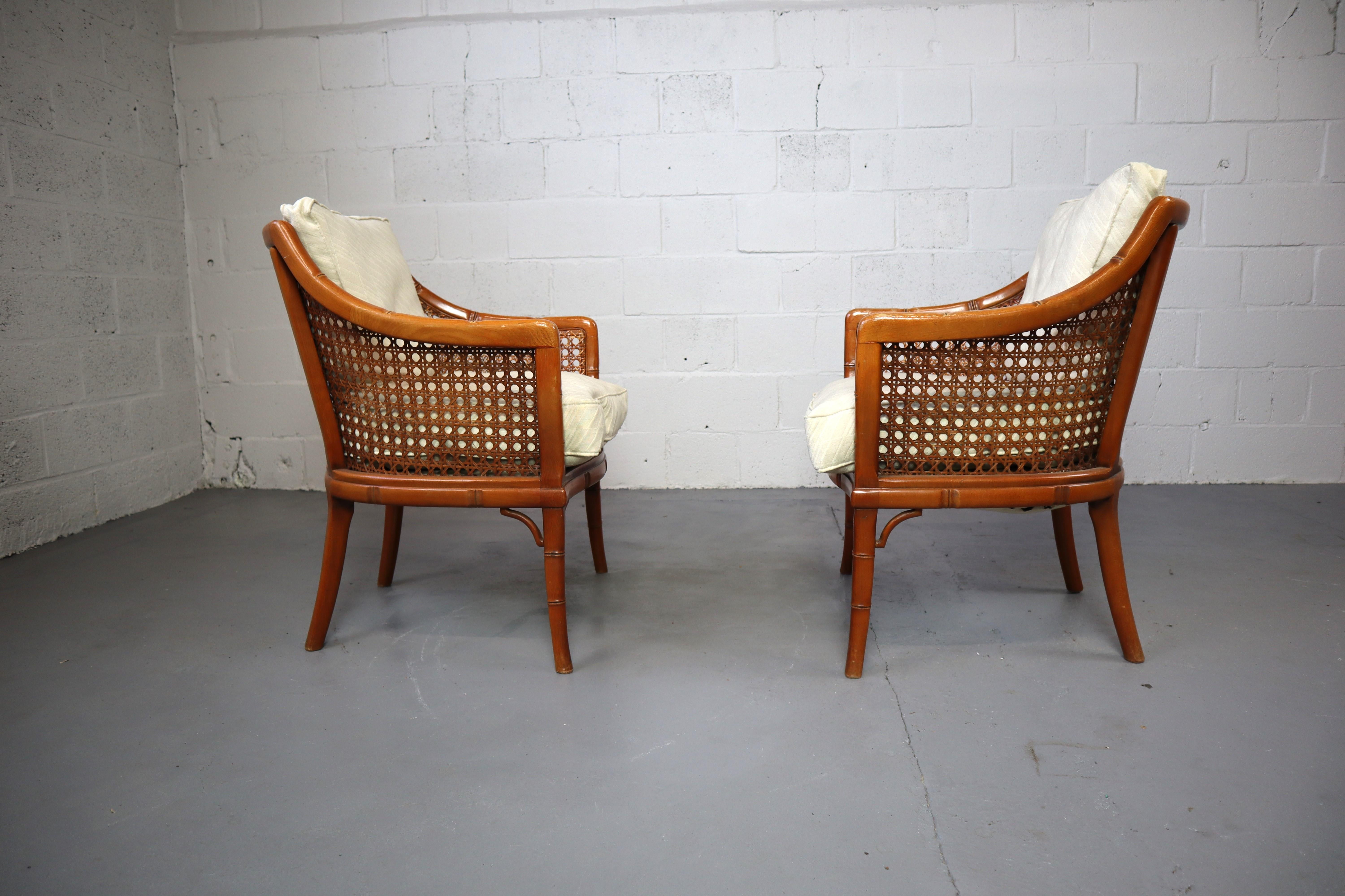 Pair of Giorgetti Faux bamboo and rattan armchairs, 1970s.
Arm chairs with great styling and comfort. The chairs are made with faux bamboo frames and woven rattan sides and backs.
