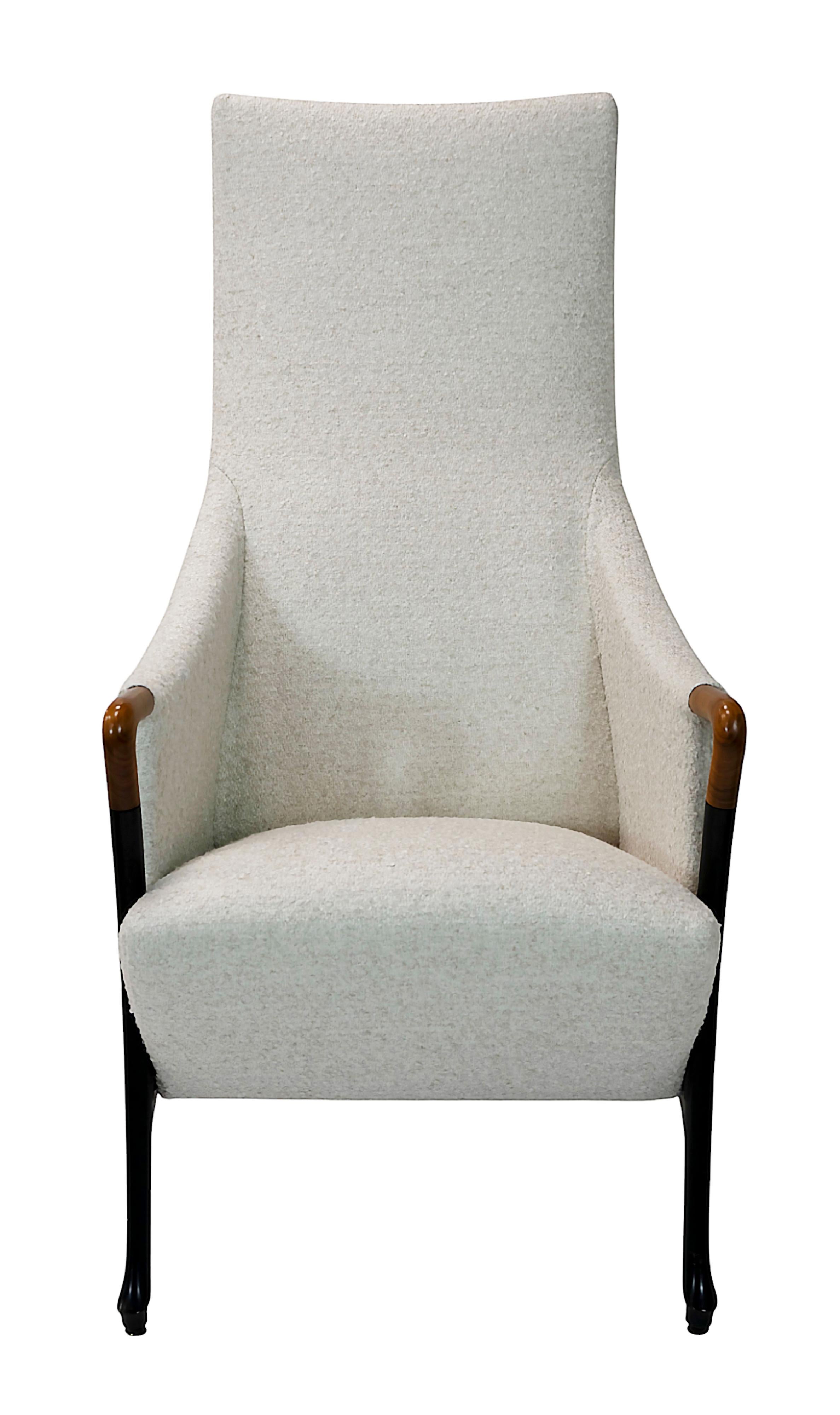 Pair of vintage Progetti armchairs including pouf, designed by Umberto Asnago.
Manufacture date circa 1980s by Giorgetti, Italy.
Pouf with labeled textile on the bottom.
Metal labeles on both armchairs and pouf.
In new white boucle textile