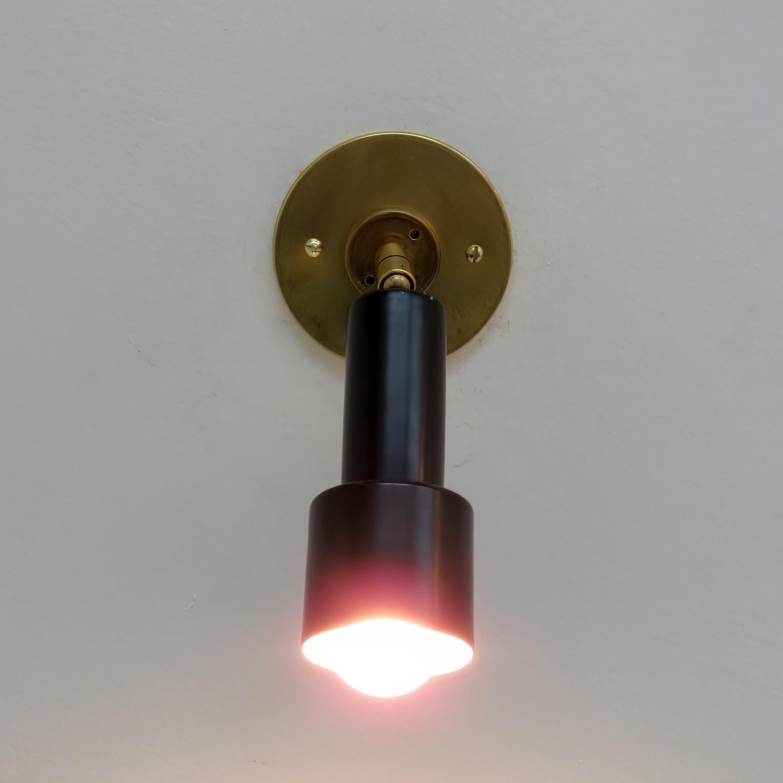 Métal Paire de lampes murales Giuseppe Ostuni, années 1960 en vente