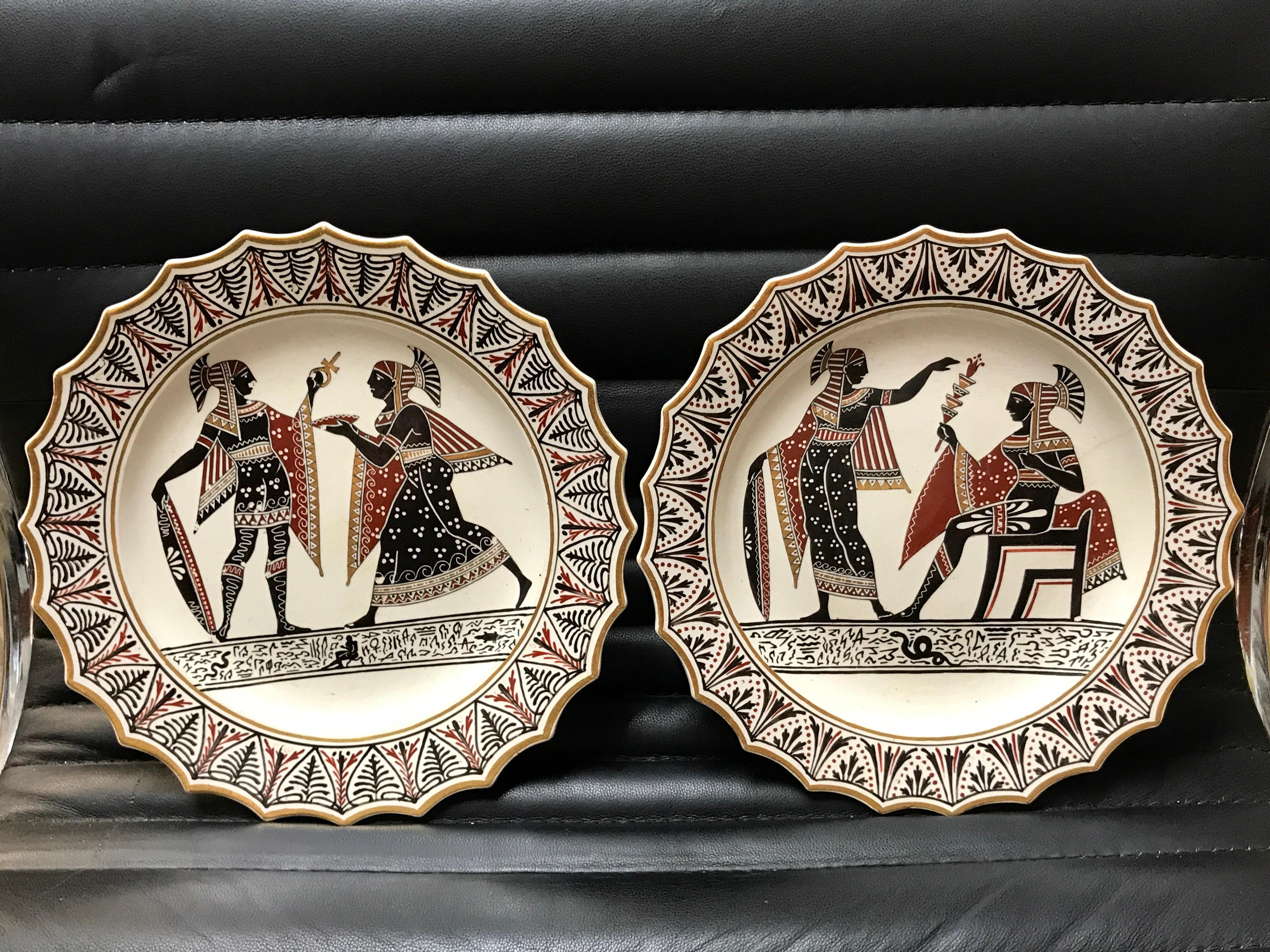 A pair of Giustiniani Egyptomania pottery plates with gilt borders
19th century, impressed script Giustiniani, and other characters.