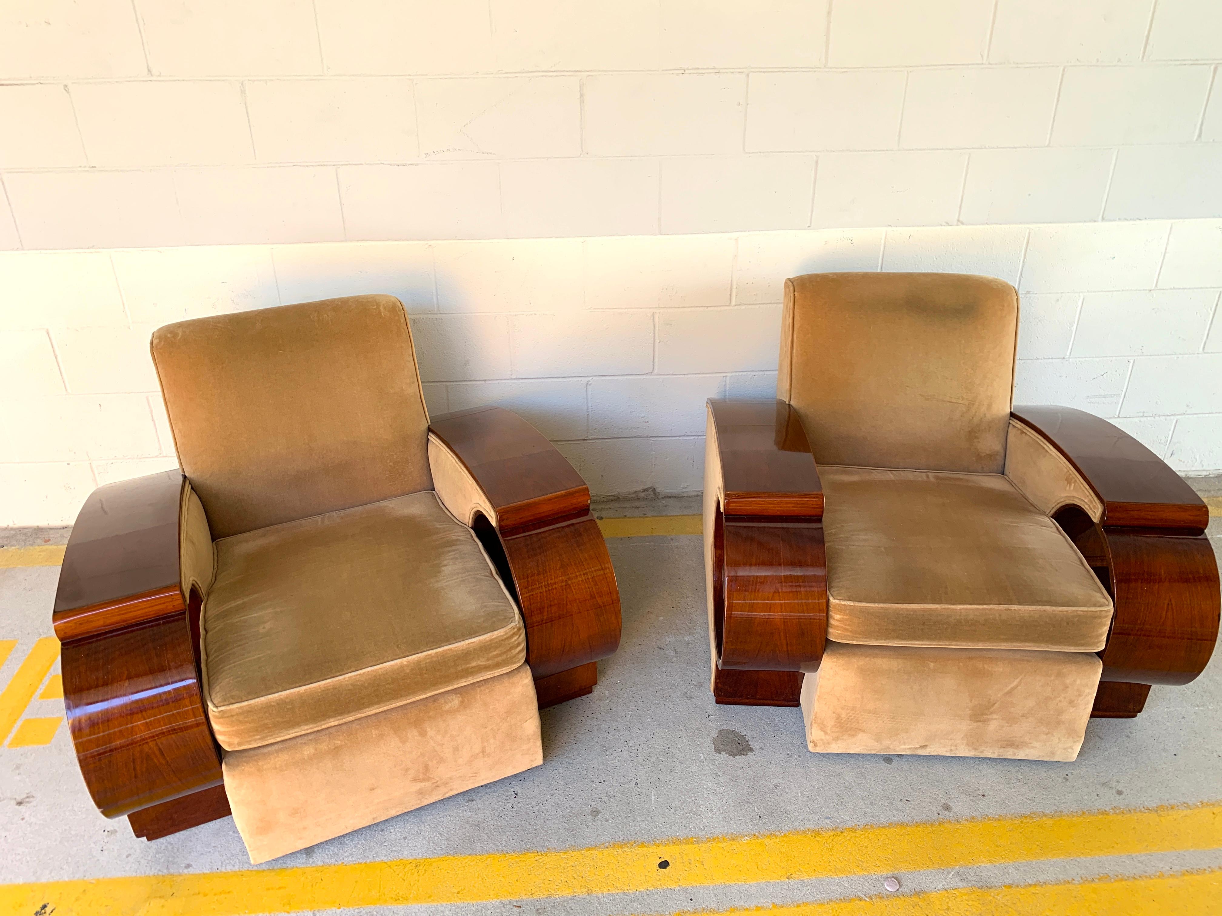 Pair of glamorous French Art Deco club chairs, Each one of grand well proportioned scale, The backrest height is 29