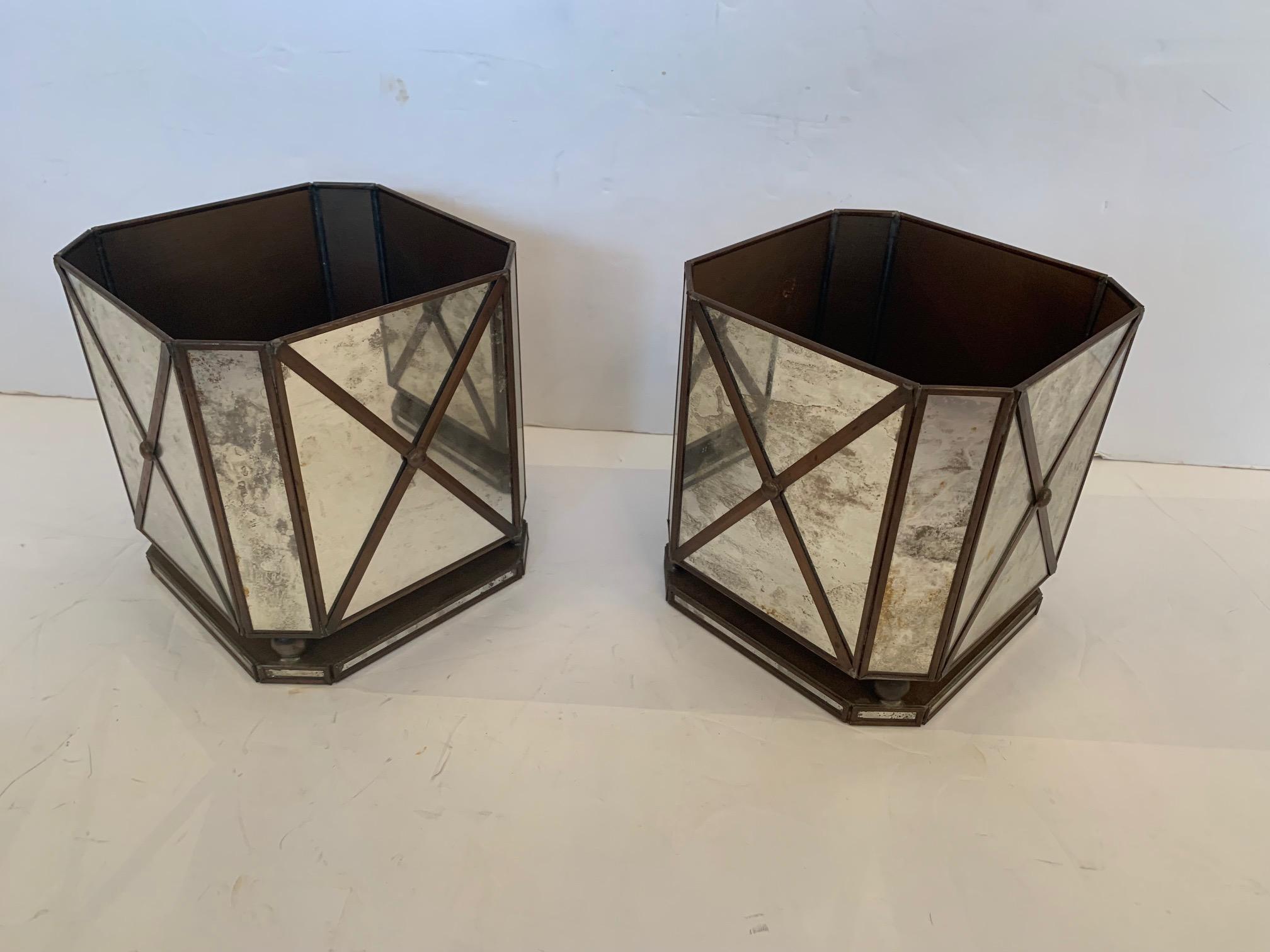 Pair of aged mirrored glamorous neoclassical square flower pots cachepot having brass X decoration.