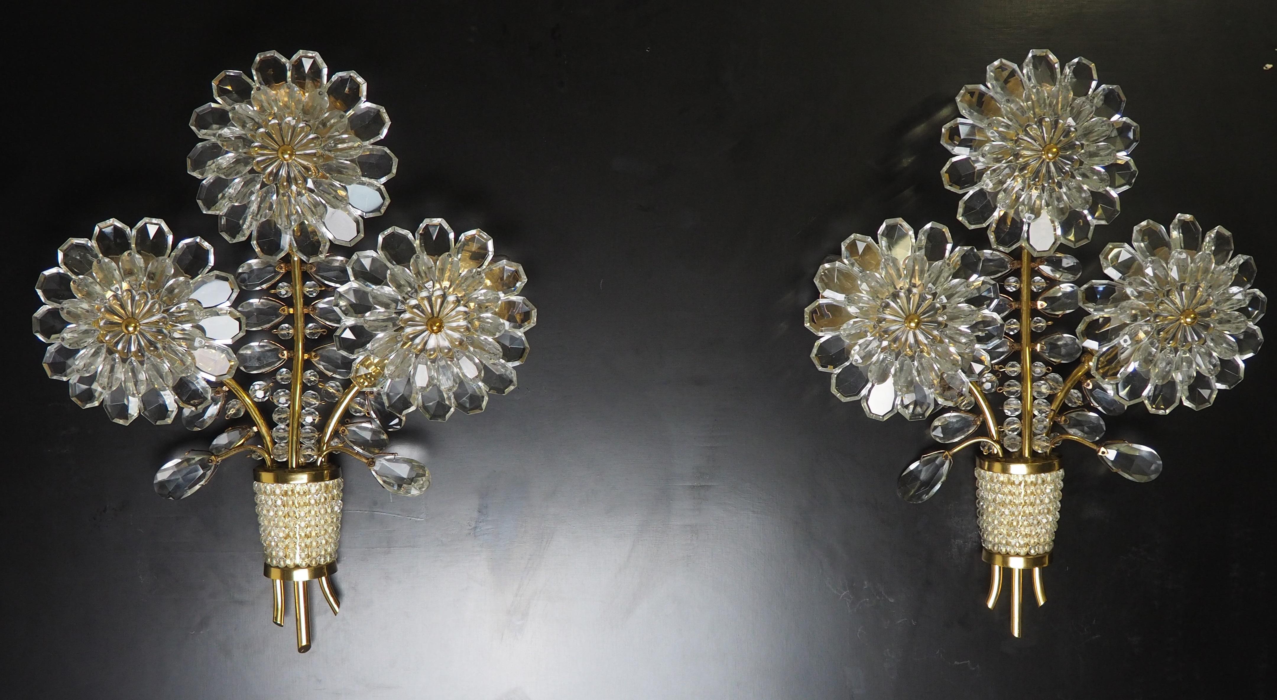 A beautiful pair of brass and crystal flower wall sconces, attributed to Lobmyer, circa 1950s.
Socket: each 3 x e14 for standard screw bulbs.
 