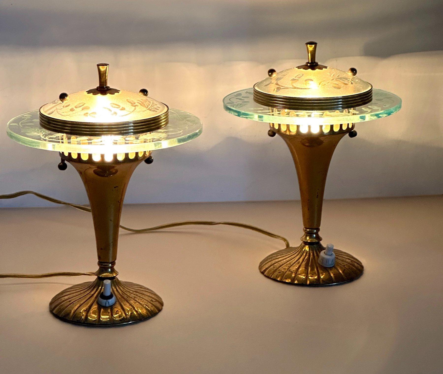 This  beautiful pair of little lamps in brass and engraved glass have been professionaly rewired and tested and currently have uk plugs on them. but for use abroad it's just a matter of changing the plugs.
They are in amazingly original conditiion