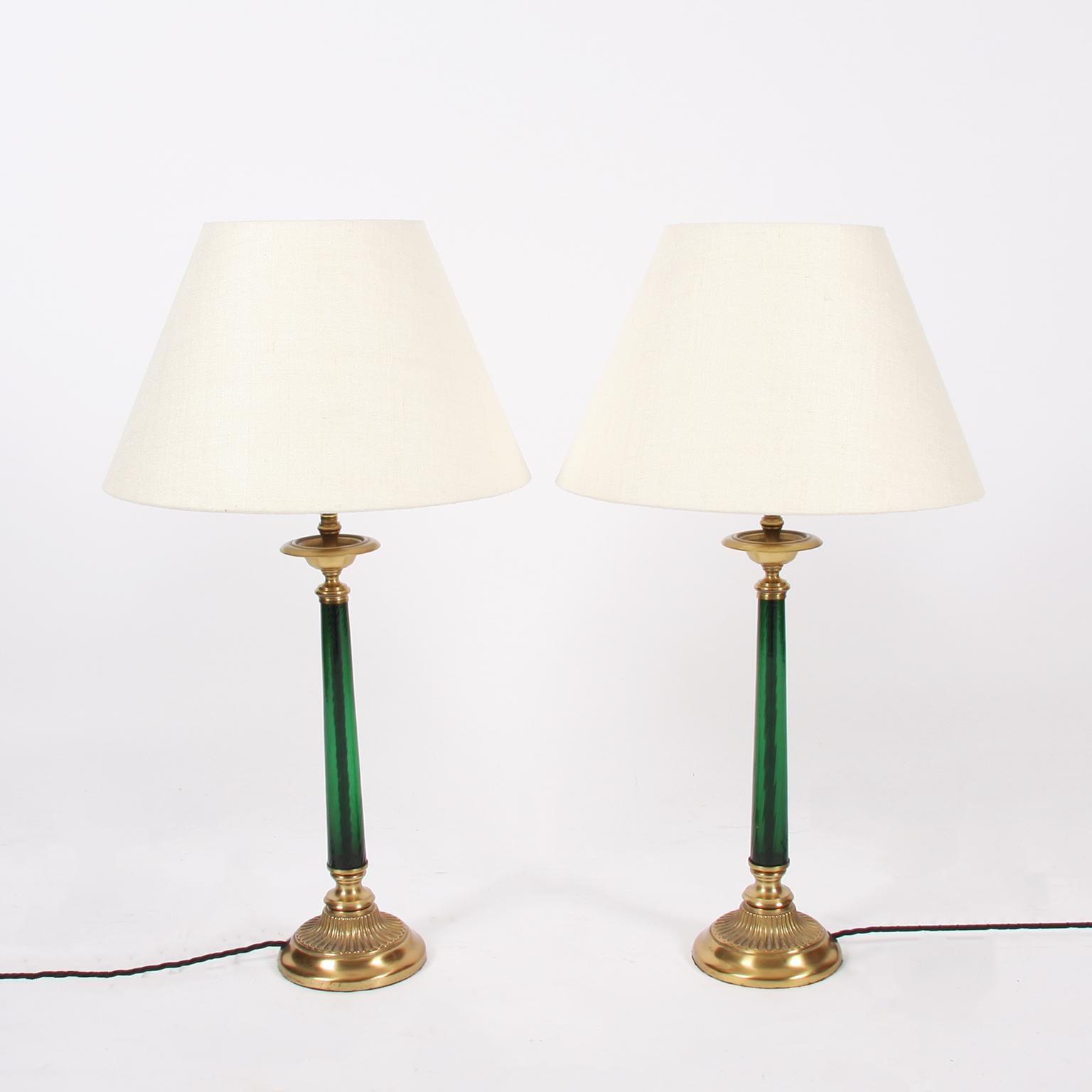 French, circa 1970.

A lovely pair of green glass, and brass, table lamps. With beautiful detail to the base. 

Rewired and PAT tested. 

Pictured with a pair of cream linen shades.
 