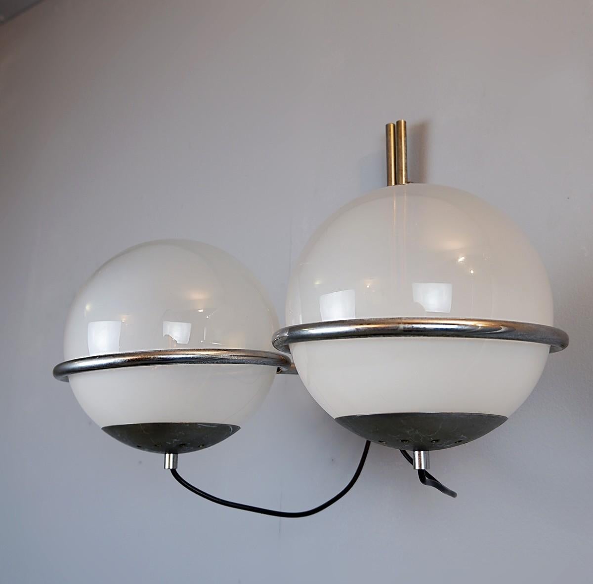 Pair of glass and chrome Italian sconces.