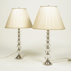 Paar Tischlampen aus Glas und versilbertem Glas