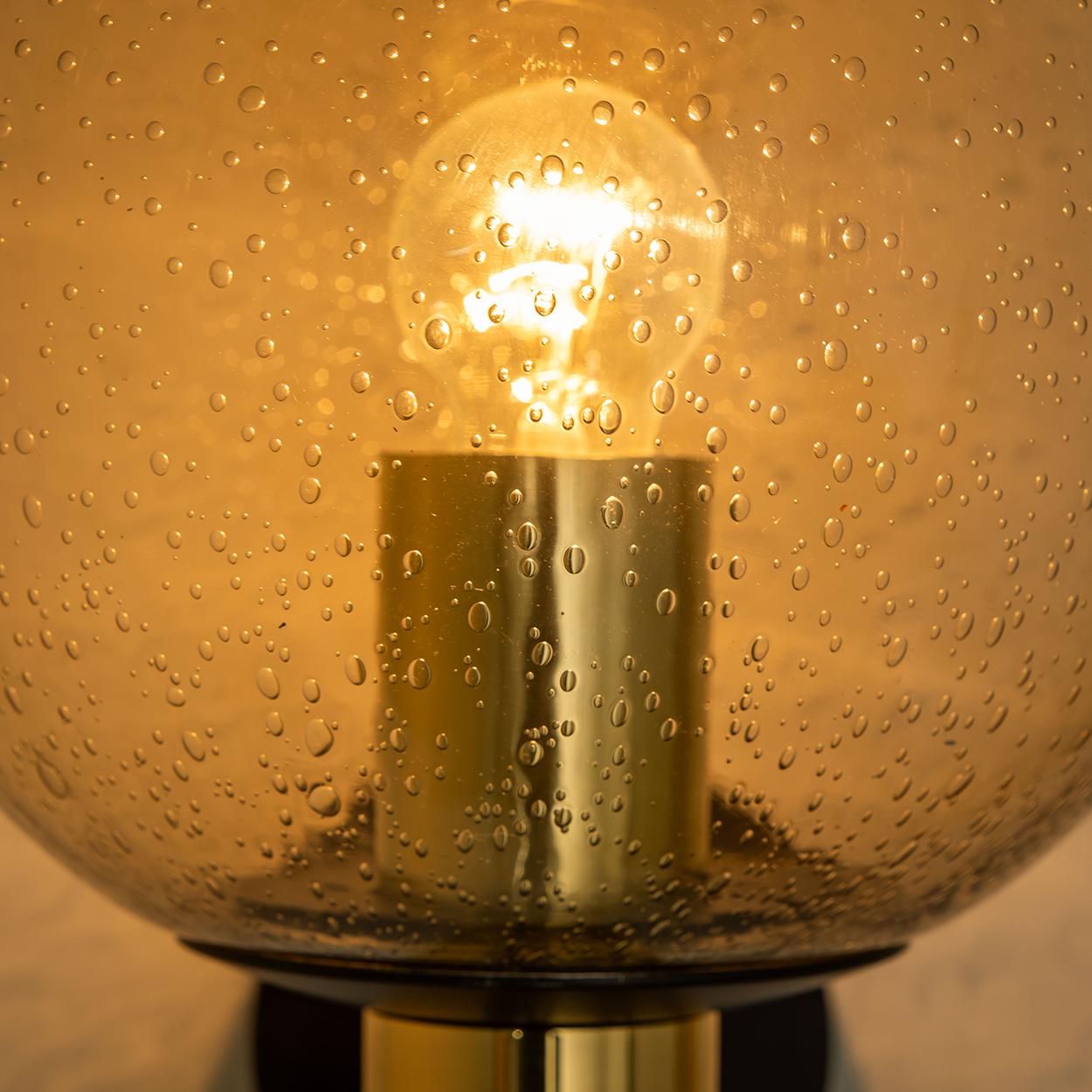 These beautiful globe lamps are made of brass and hand-blown smoked grey/ brown  Murano glass. Manufacturer Glashütte Limburg

The lamps are from the 1970s and are in good vintage condition. 


