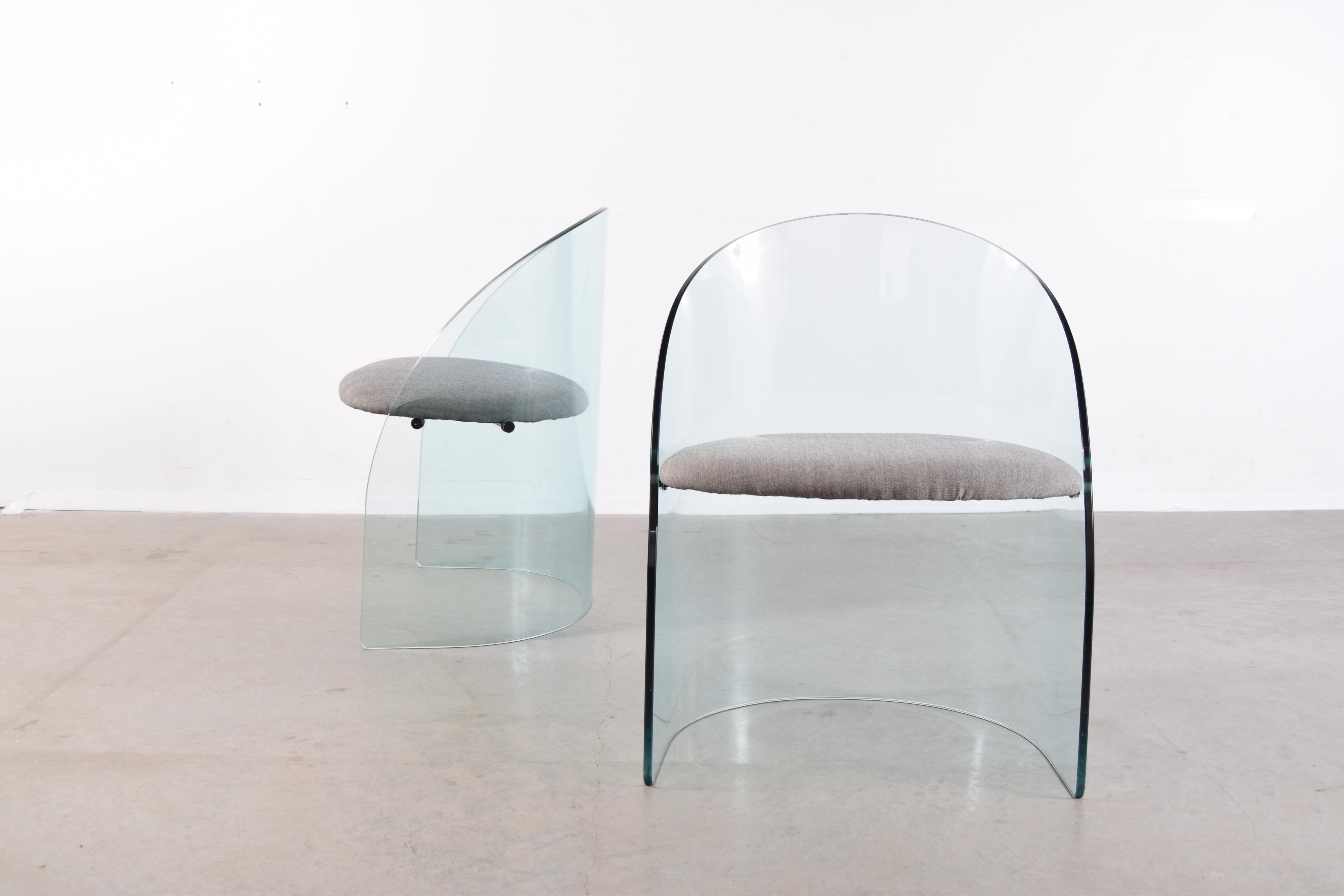 Pair of plate glass chairs in the manner of the chair that Louis Dierra designed for the Glass Center Pavillon at the 1939 World’s Fair in New York, that were manufactured by the Pittsburgh Plate Glass company. Unsure as to the designer /