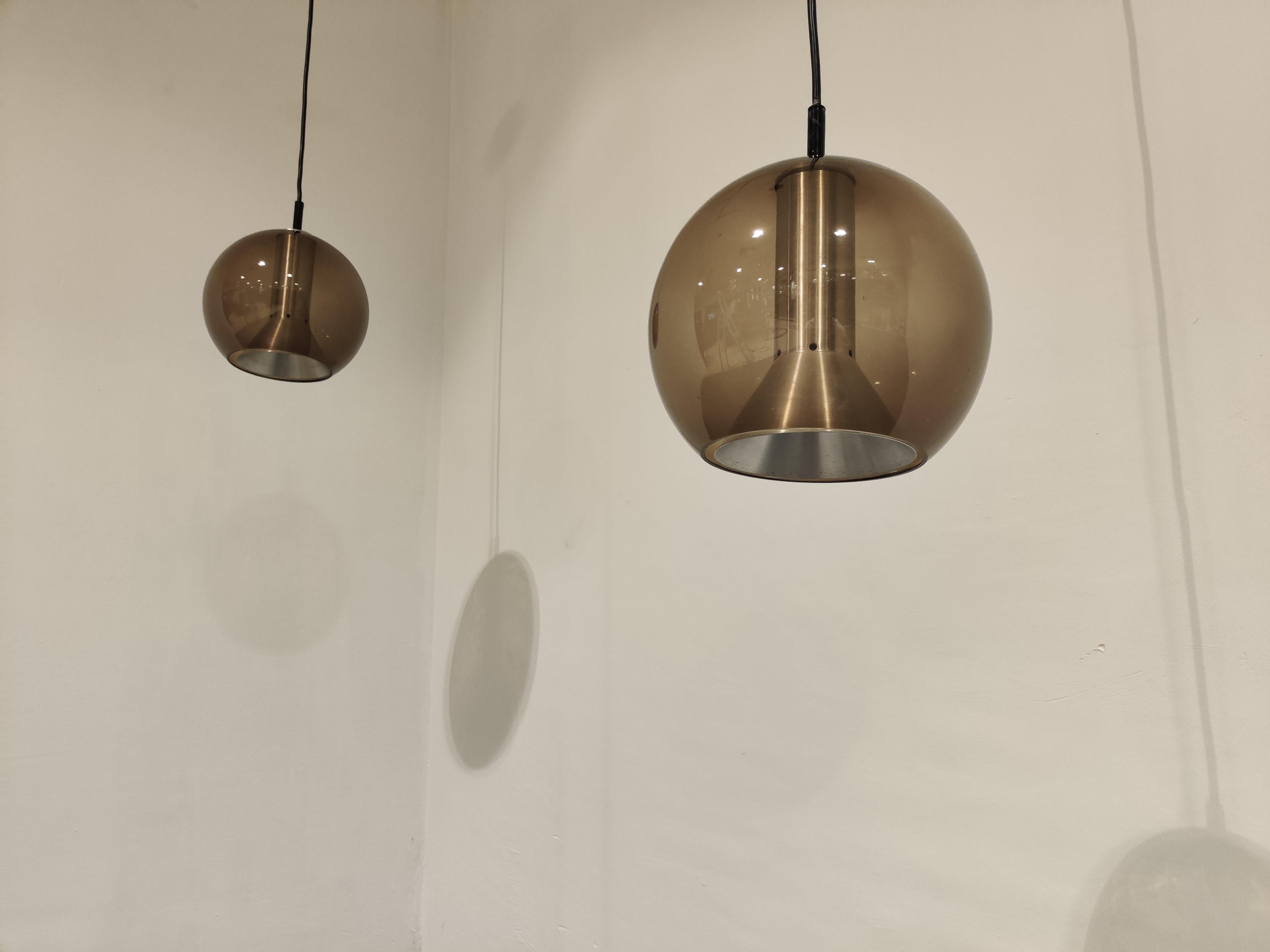 Space Age Pair of Glass Globe Pendant Lights by Frank Ligtelijn for Raam, 1960s